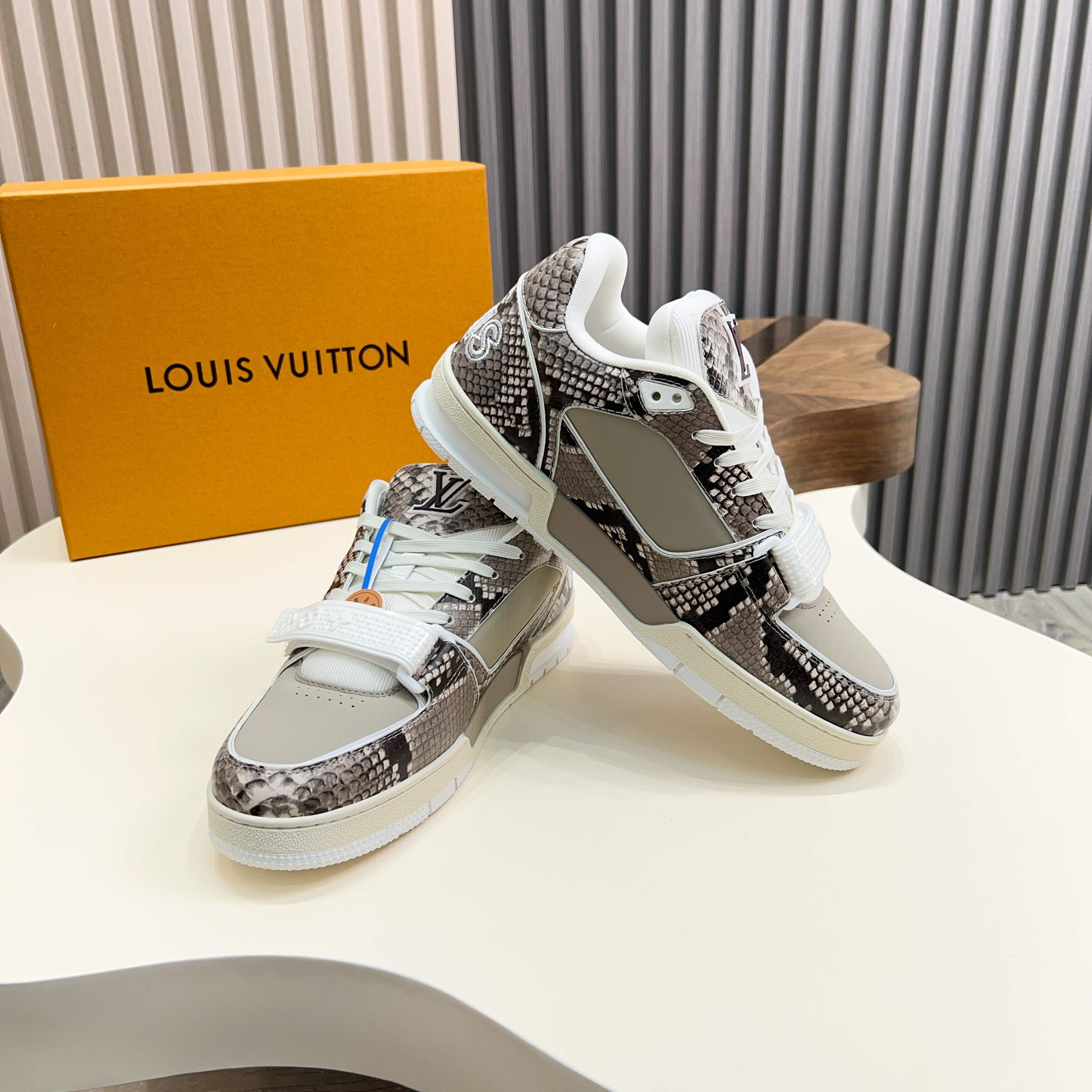Louis Vuitton Trainer Sneaker in Monogram Embossed Leather 10 a1743229987842 8062