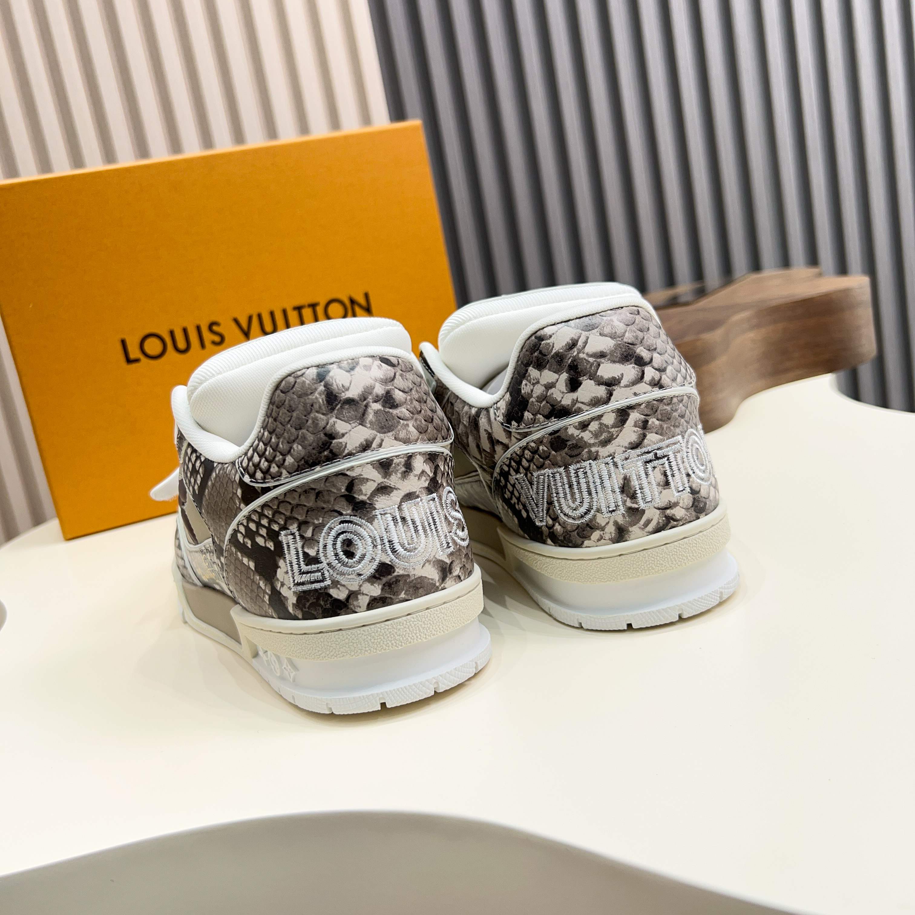 Louis Vuitton Trainer Sneaker in Monogram Embossed Leather 8 a1743229988019 4250