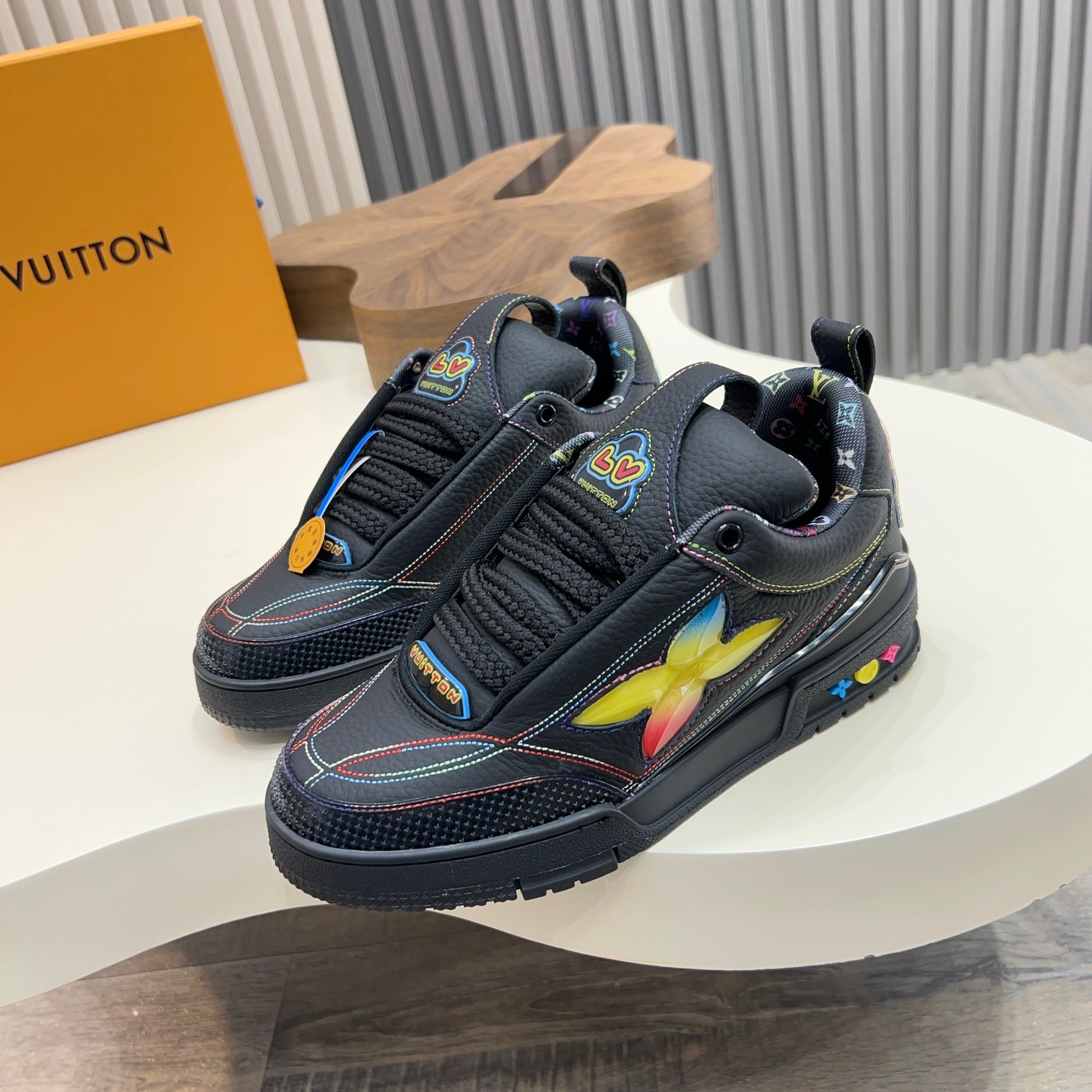 Louis Vuitton Trainer Sneakers in Black Leather with Monogram Detailing 2 a1744496829346 3666