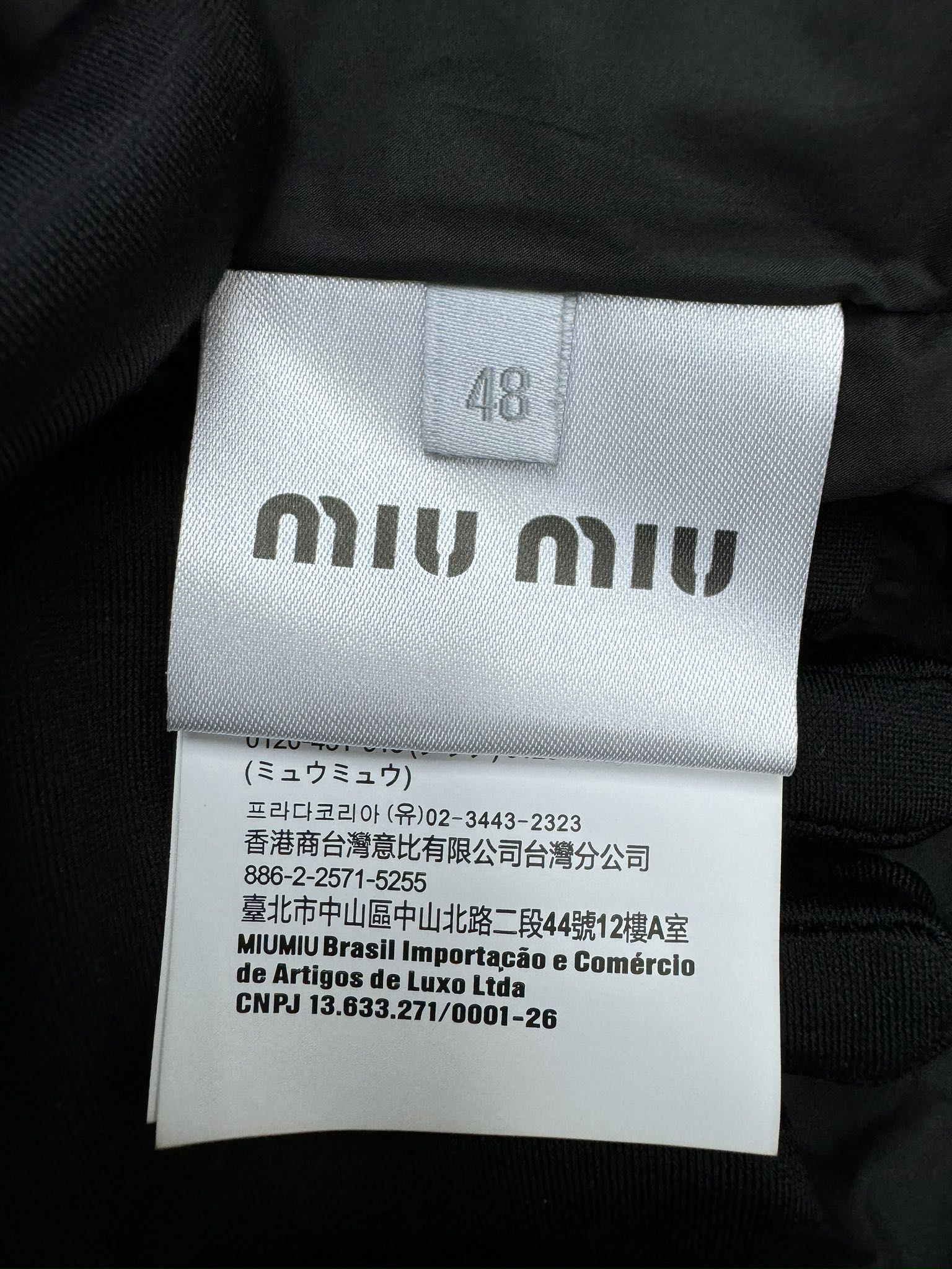 MIUMIU 贴布绣羽绒服外套 9