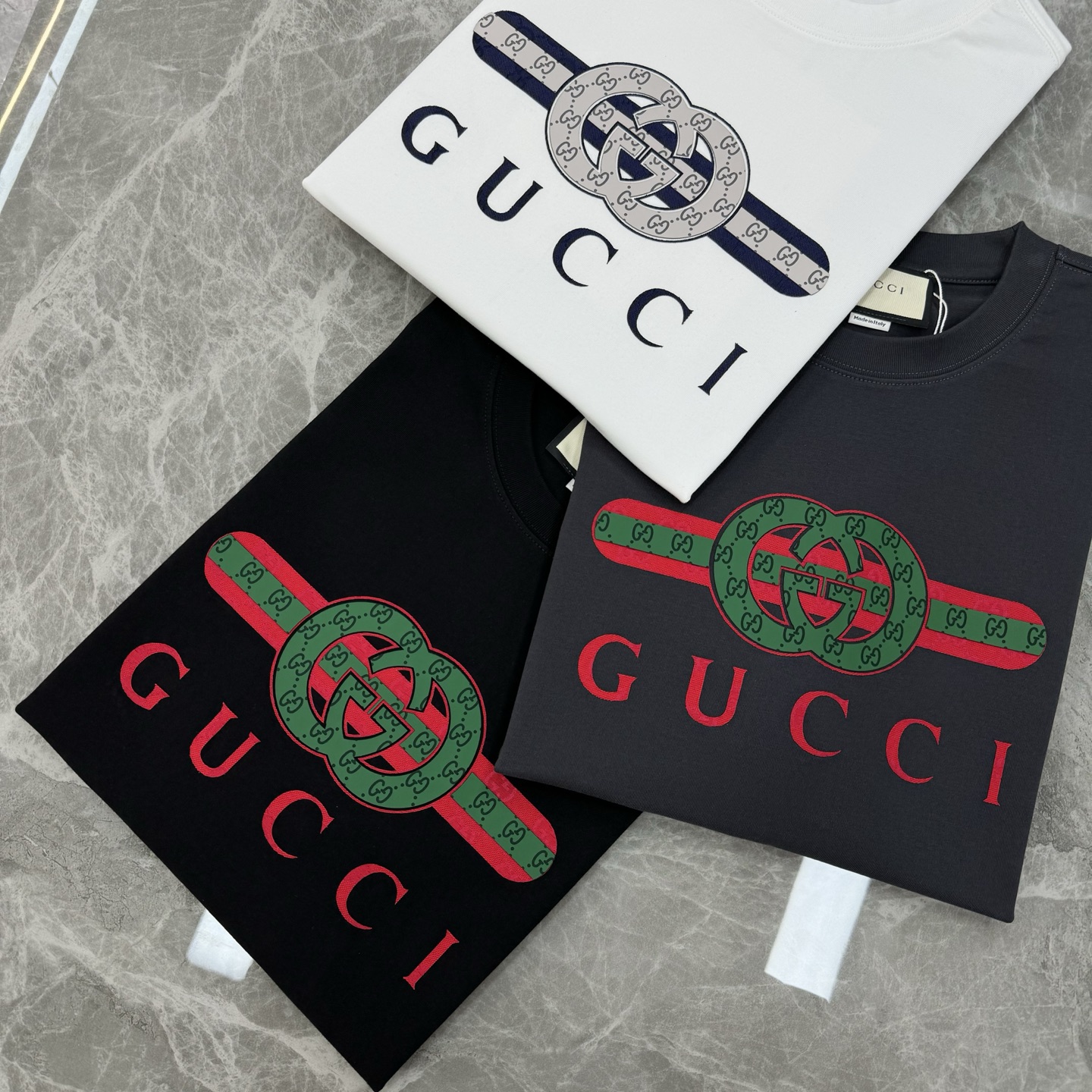 
⚜️GUCC*潮牌25s新款圆领T恤.男女同款～潮人必备！胸前定制品牌图形烫画工艺.平面硅胶搭配定制G