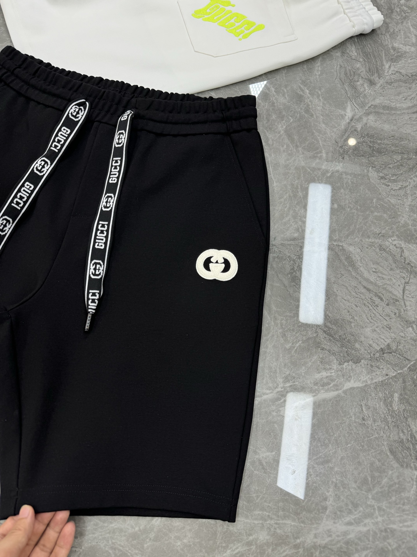 GUCC*25s潮牌五分短裤❤️男女同款！休闲运动风格.经典大牌新推系列将吊绳字母搭配图形巧妙融入运动装