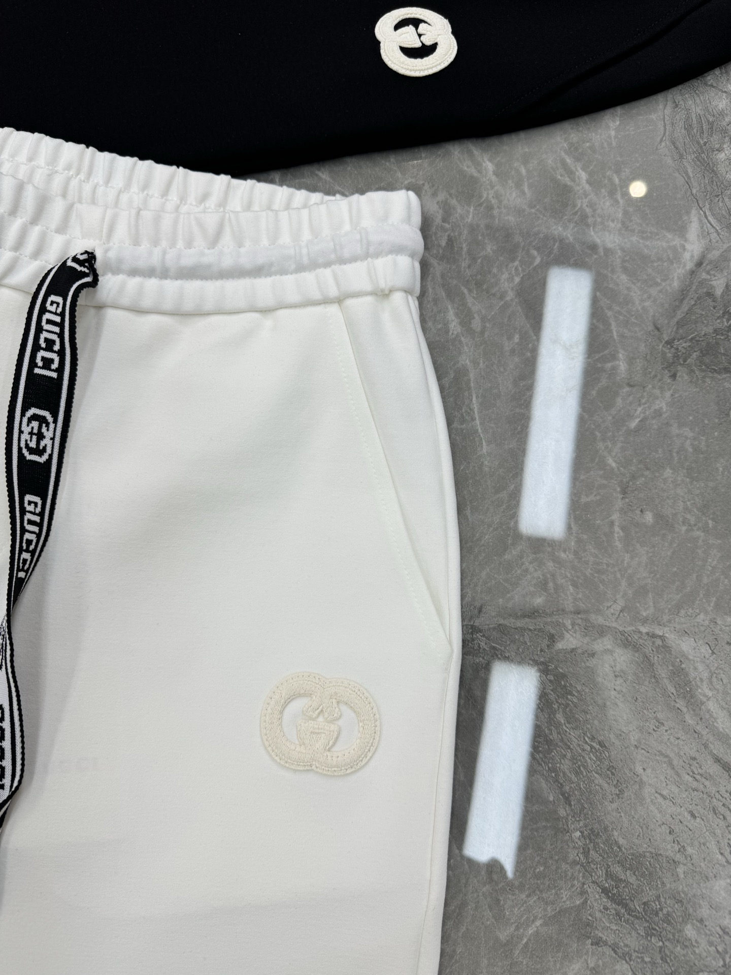 GUCC*25s潮牌五分短裤❤️男女同款！休闲运动风格.经典大牌新推系列将吊绳字母搭配图形巧妙融入运动装