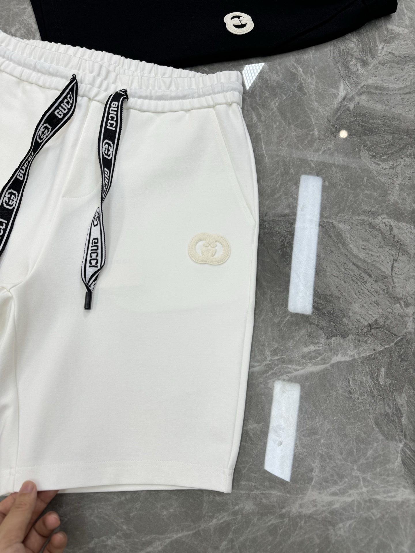 GUCC*25s潮牌五分短裤❤️男女同款！休闲运动风格.经典大牌新推系列将吊绳字母搭配图形巧妙融入运动装