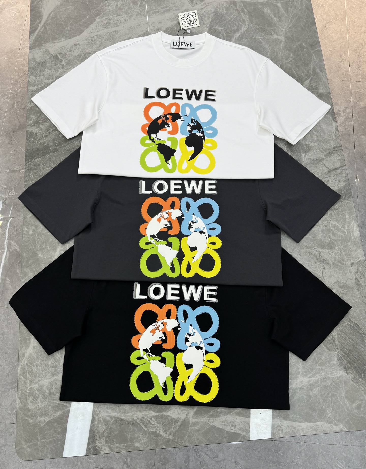 LOEW*罗意-威经典款T恤.25s新款男女同款！经典罗意*威图形3D立体印花设计.层次丰富.色彩丰富多