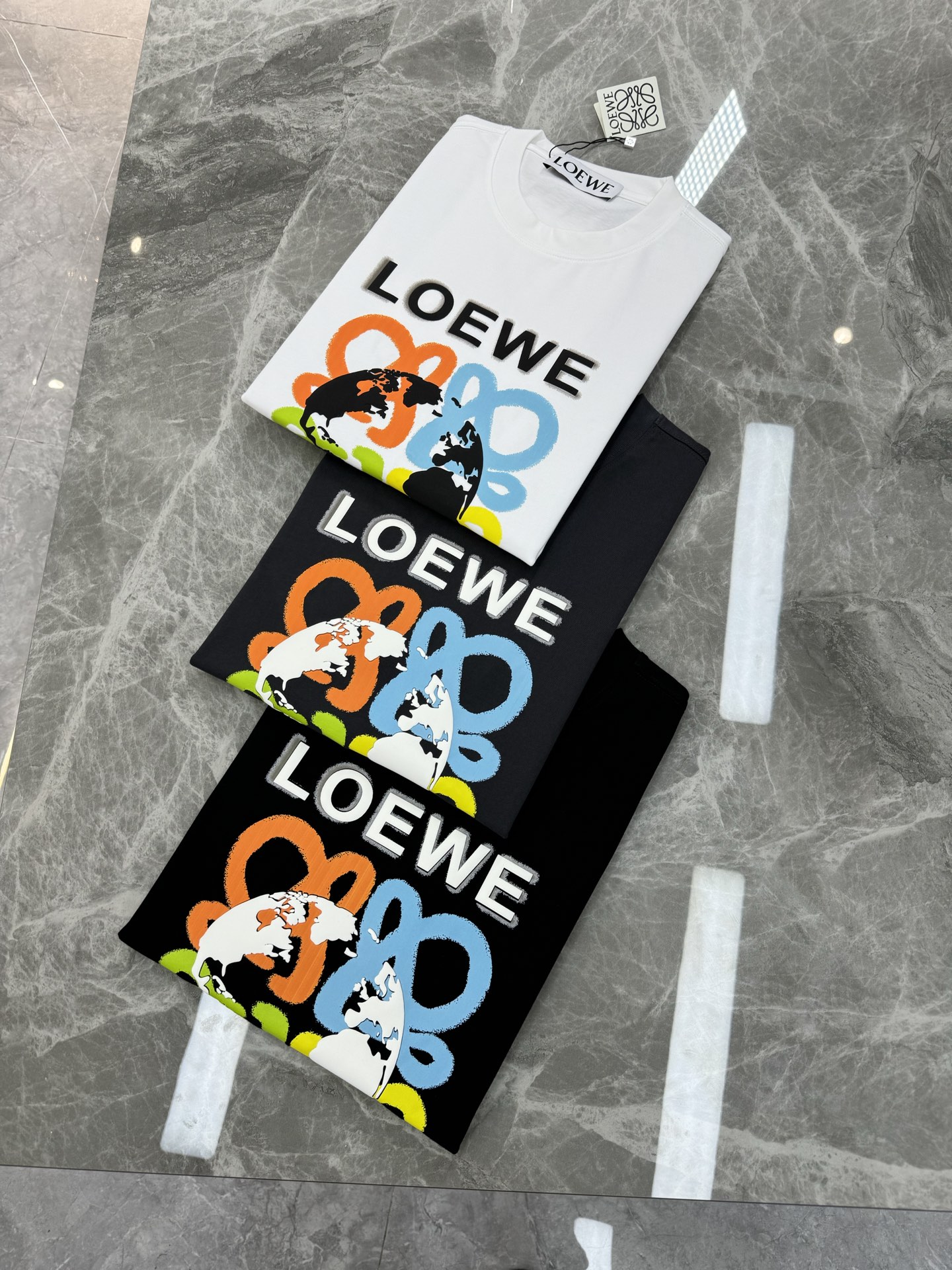 LOEW*罗意-威经典款T恤.25s新款男女同款！经典罗意*威图形3D立体印花设计.层次丰富.色彩丰富多