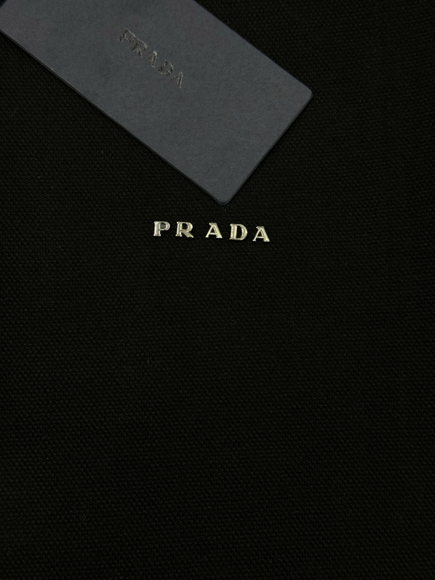 PRADA普拉达25s秋季男士长袖翻领Polo.胸前经典Prada标识.高周波立体工艺.简单高级.整体纯