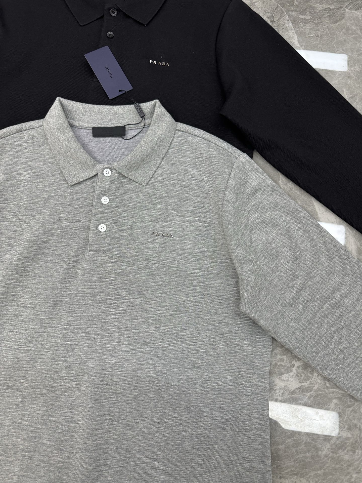 PRADA普拉达25s秋季男士长袖翻领Polo.胸前经典Prada标识.高周波立体工艺.简单高级.整体纯