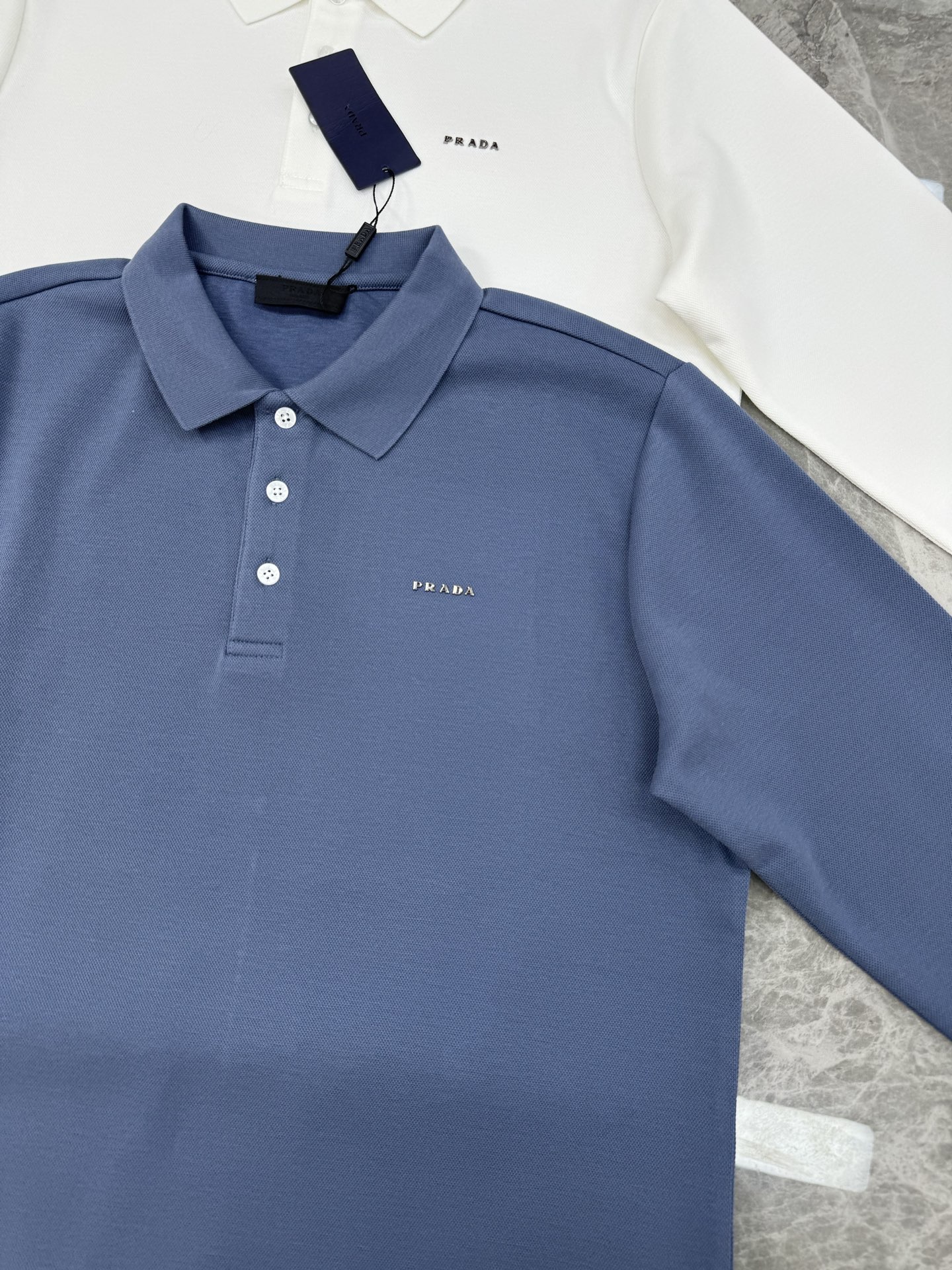 PRADA普拉达25s秋季男士长袖翻领Polo.胸前经典Prada标识.高周波立体工艺.简单高级.整体纯