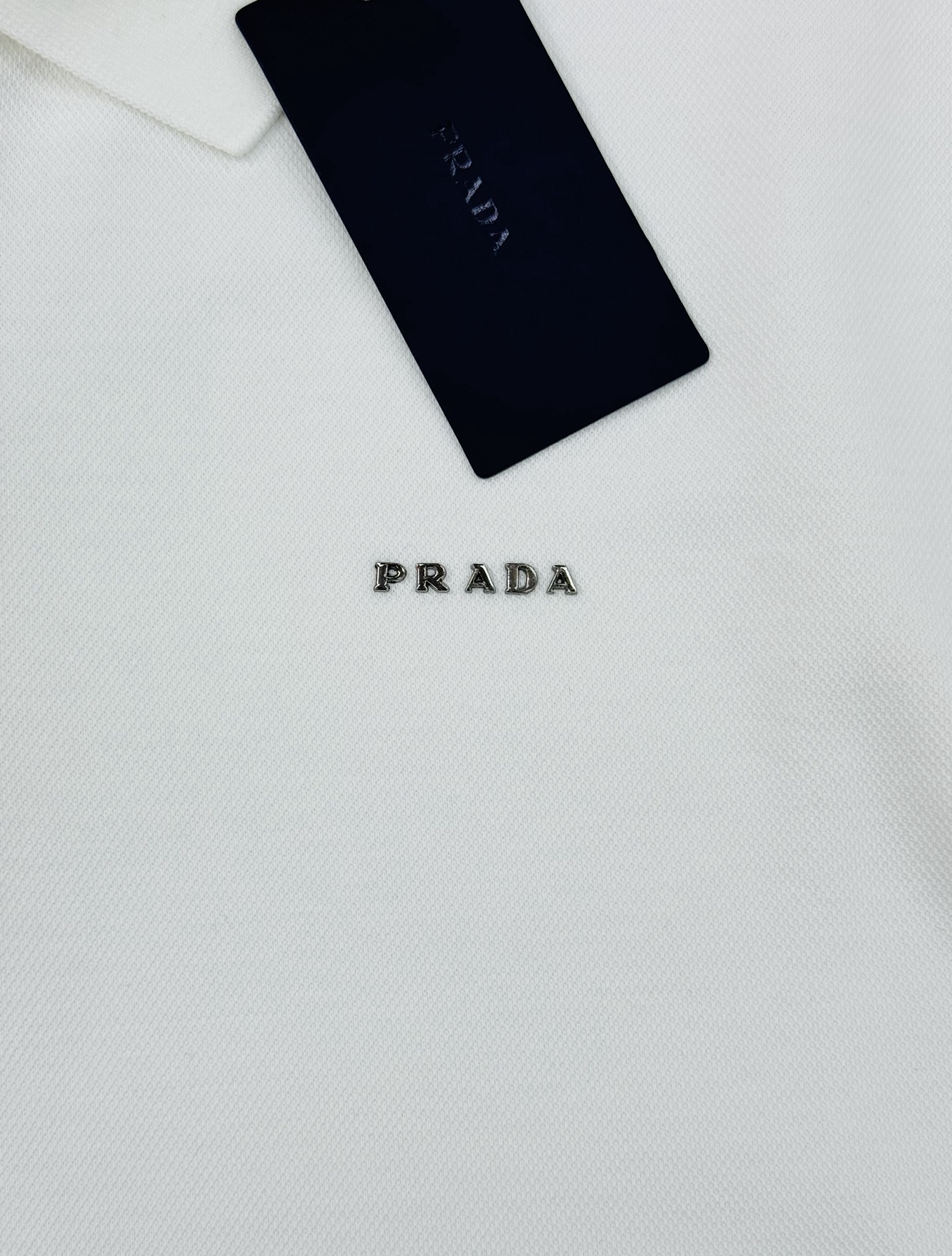 PRADA普拉达25s秋季男士长袖翻领Polo.胸前经典Prada标识.高周波立体工艺.简单高级.整体纯