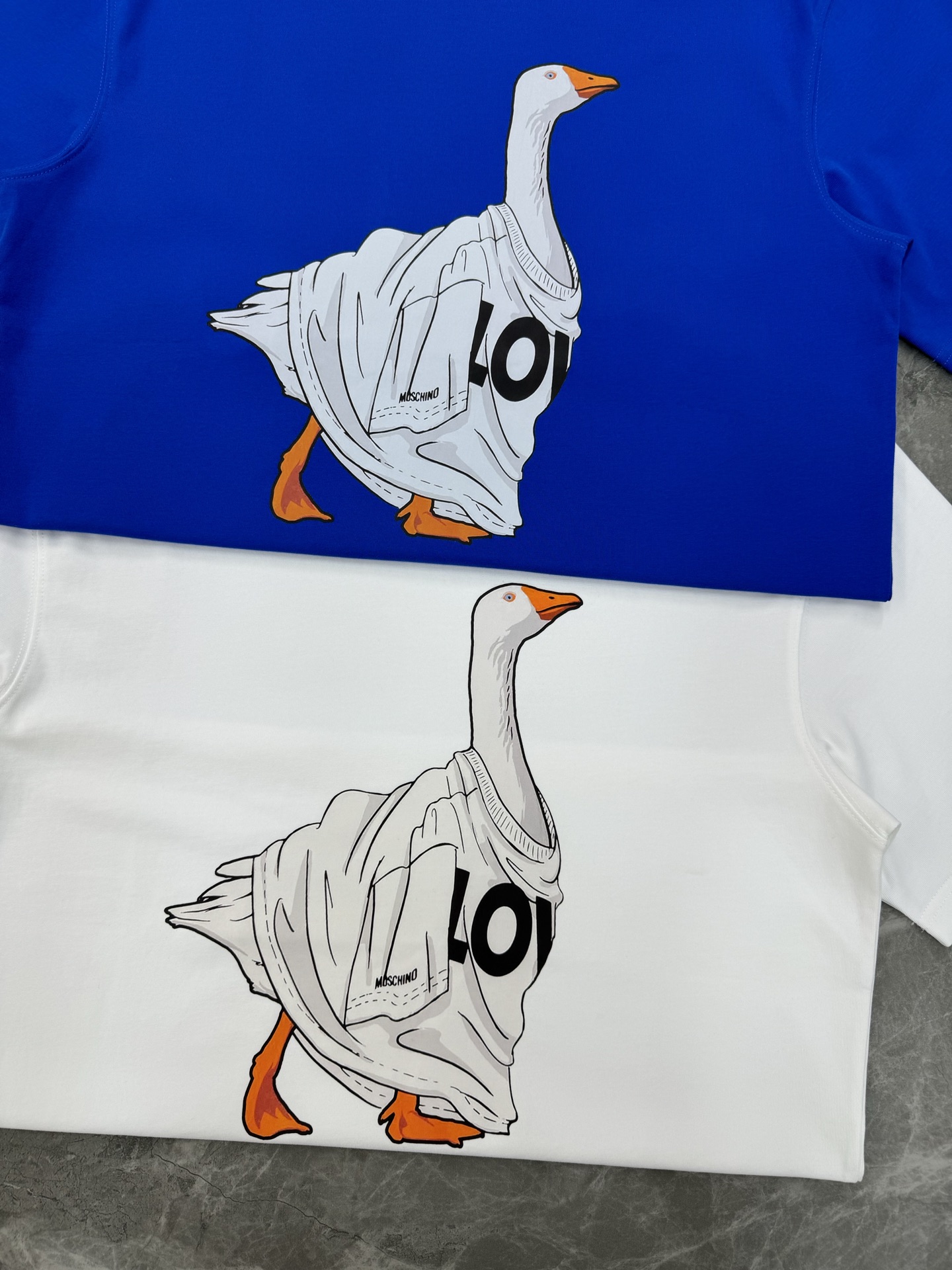 。🌾 MOSCHIN*莫斯奇诺*新品🆕潮牌情侣款T恤.原单推荐！大白鹅品牌潮流.街头风的新纪…整体图形质