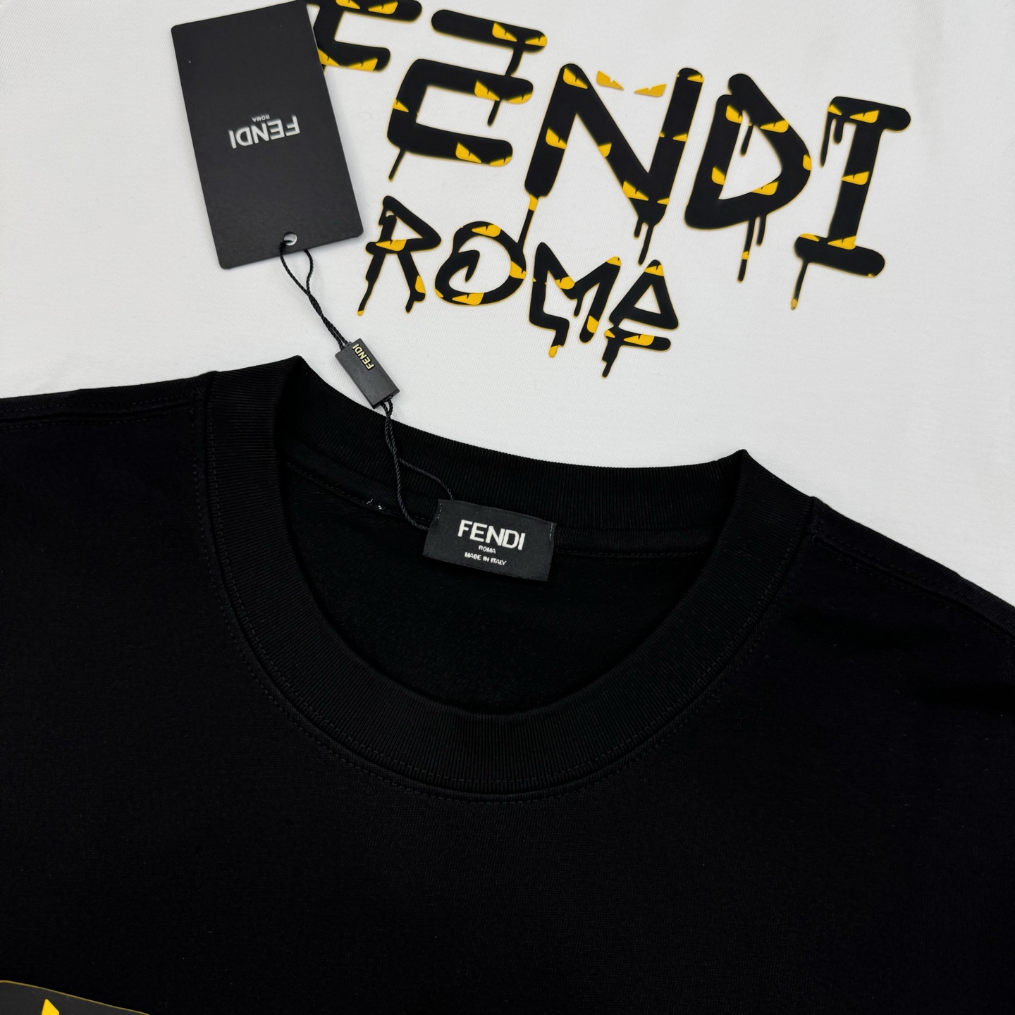 Fendi 芬迪新款潮牌T恤.男女同款❤️滴滴漆印花效果.高温立体烫画工艺.胸前黄色FF字母融合罗马字样
