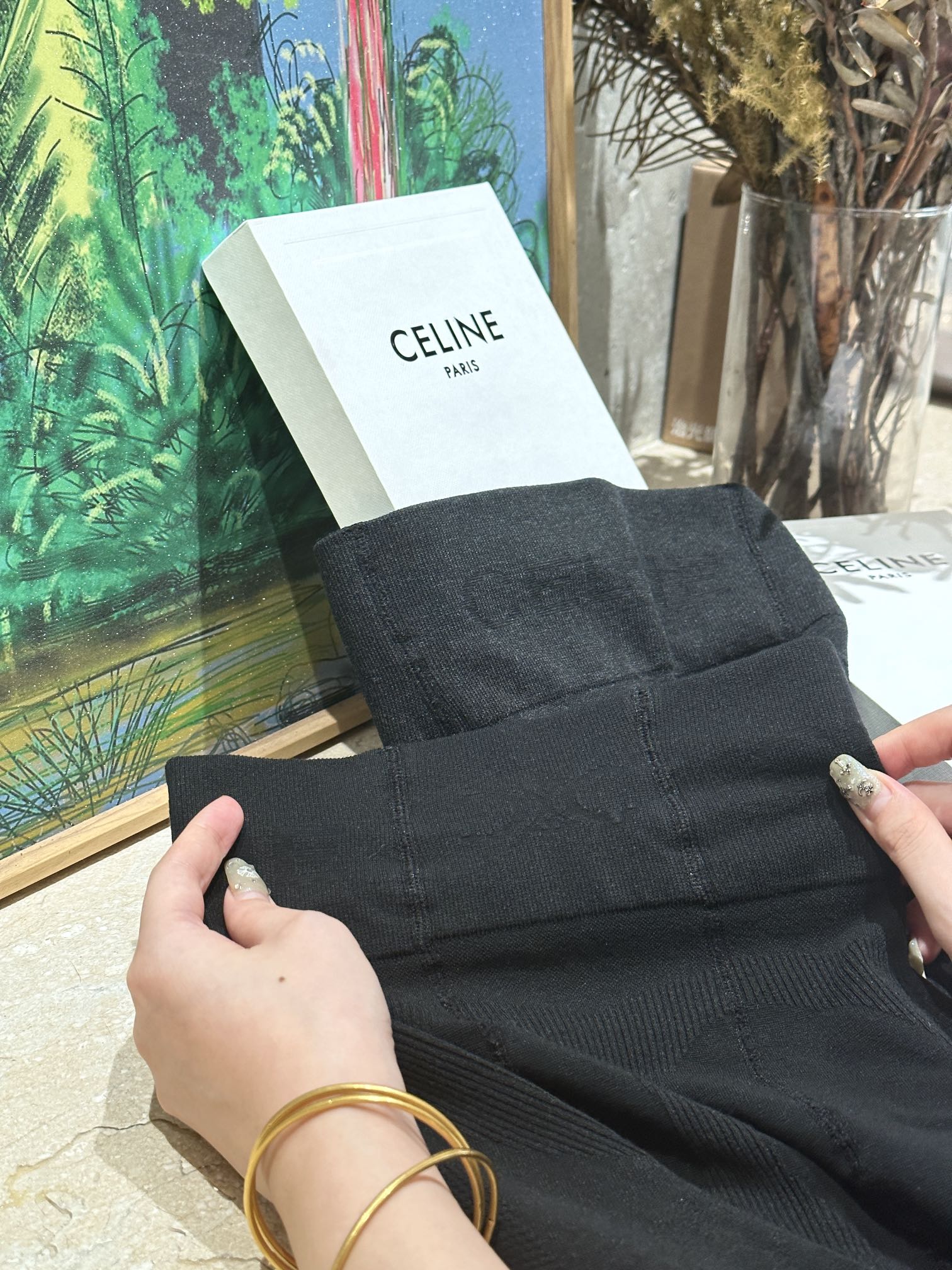 featuring the signature Triomphe emblem alongside the Celine knit motif - Comprehensive 7