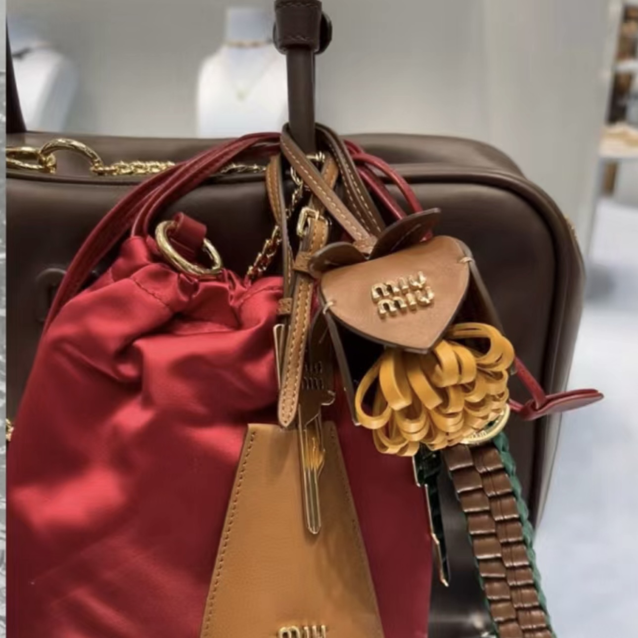 Miu-style bag charms, designed to be styled and layered in multiples in - Bag 4