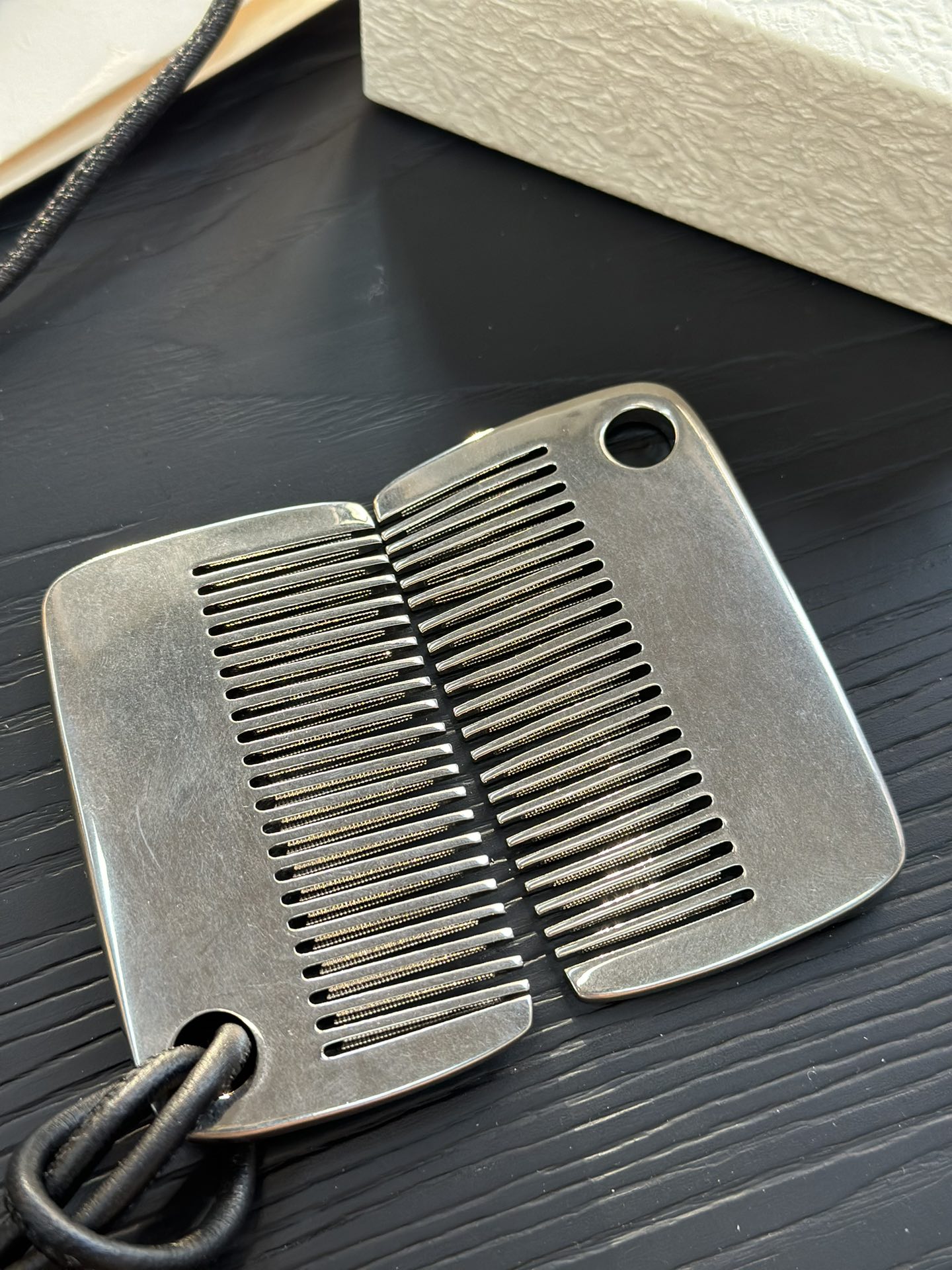 The necklace features an antique-distressed finish, imparting a - Comprehensive 4