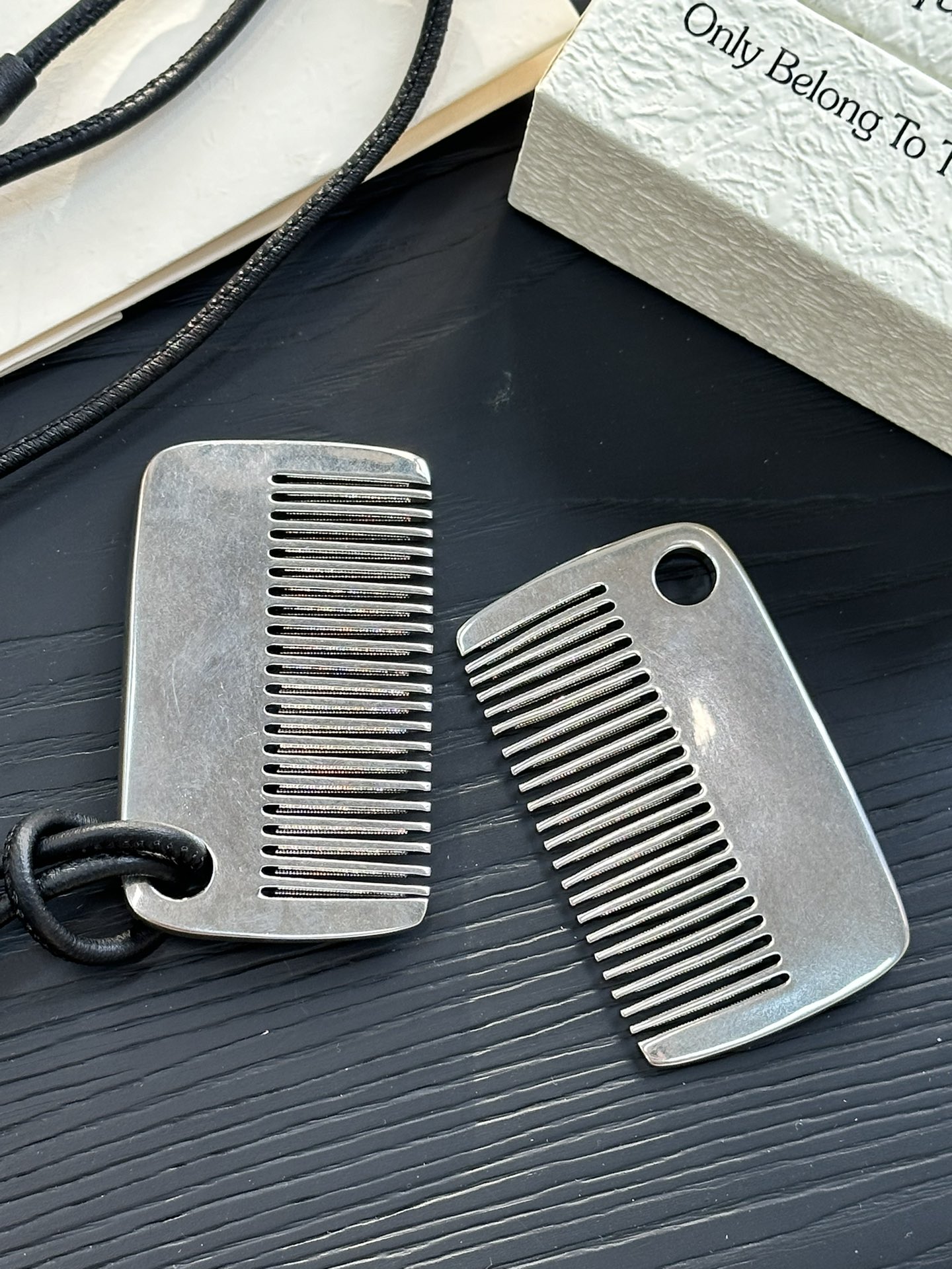 The necklace features an antique-distressed finish, imparting a - Comprehensive 2