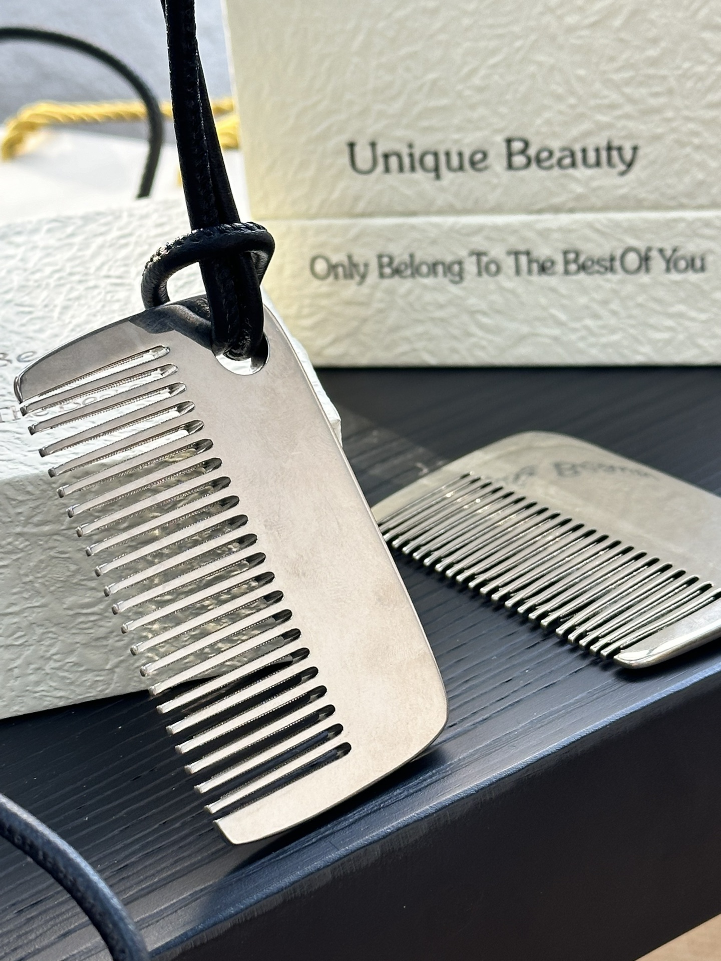 The necklace features an antique-distressed finish, imparting a - Comprehensive 5
