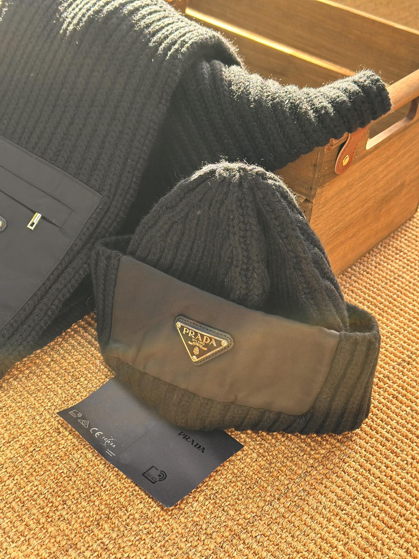 The set also includes a Prada Re-Nylon and wool paneled beanie - Comprehensive