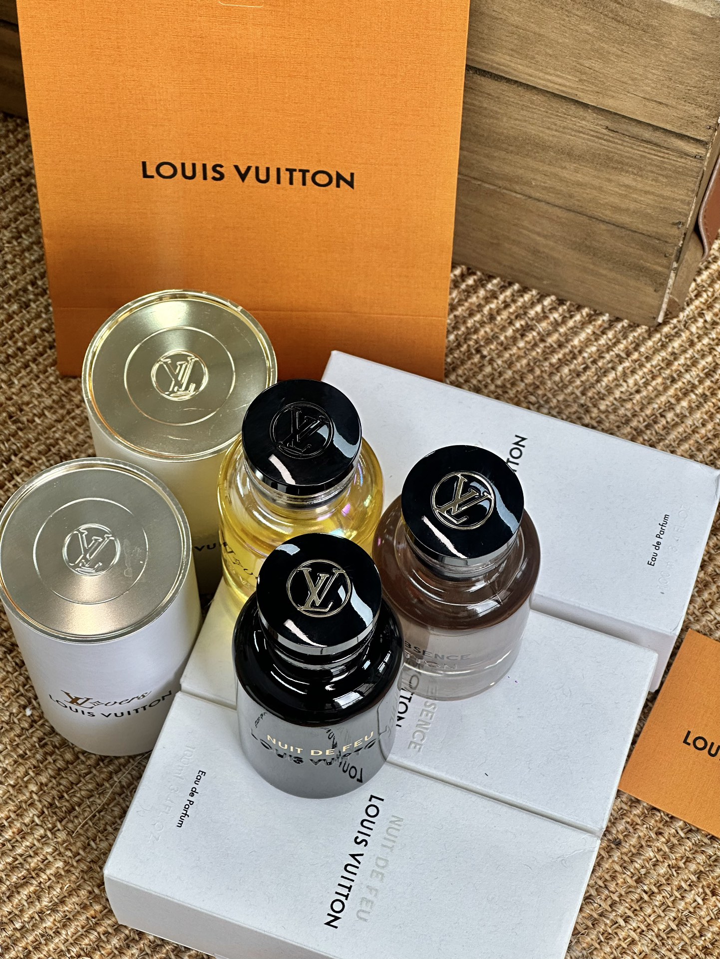 The bottle cap features an embossed LV logo - Comprehensive