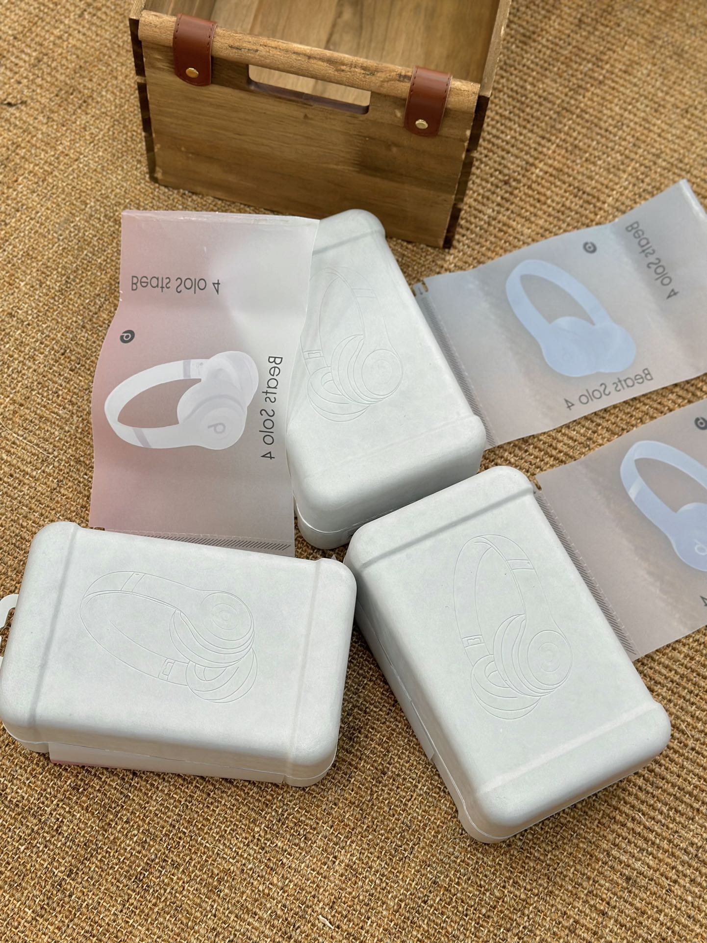 the headphones include a black carrying pouch, a charging cable, an - Comprehensive 5