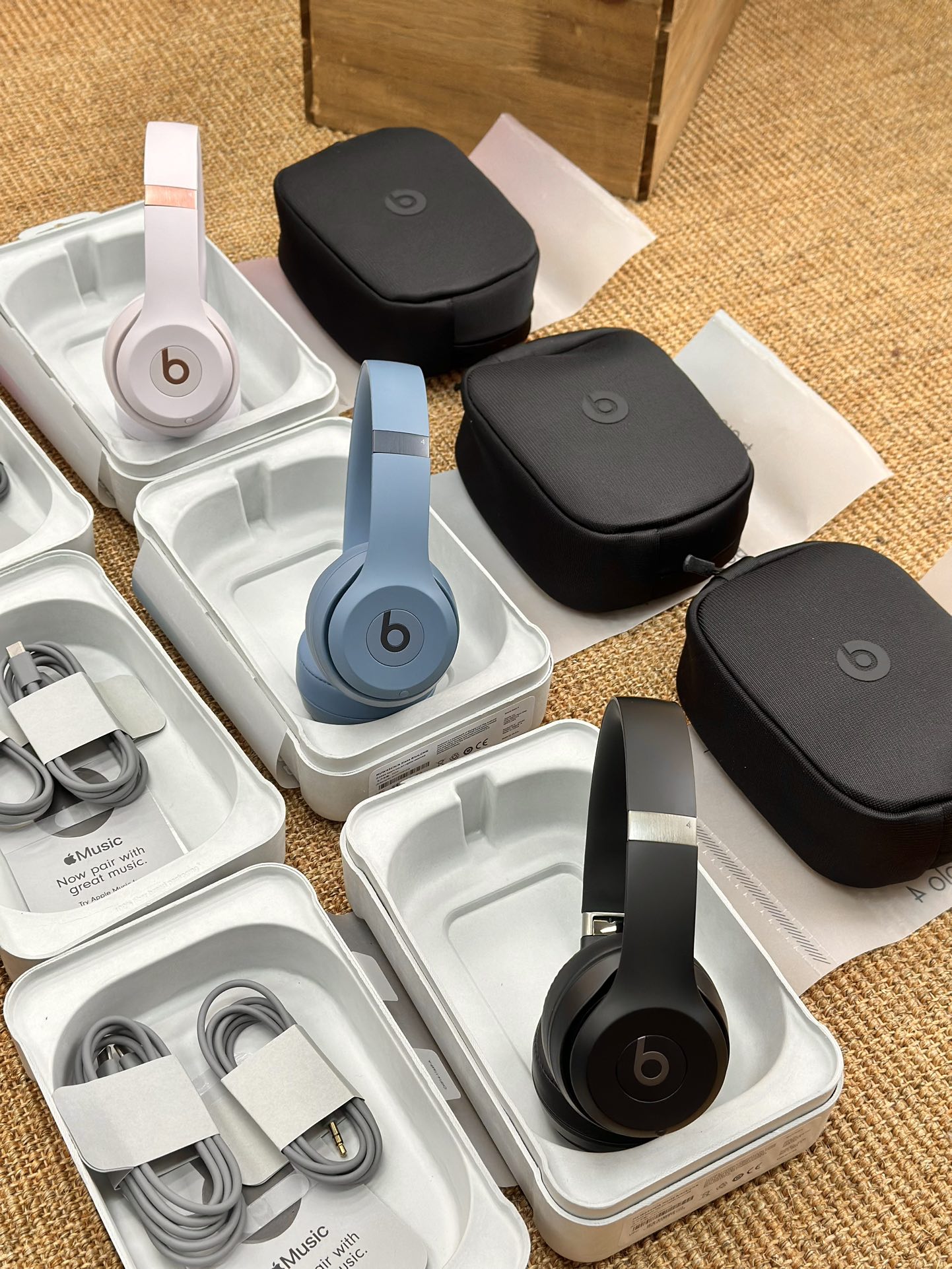 the headphones include a black carrying pouch, a charging cable, an - Comprehensive 8