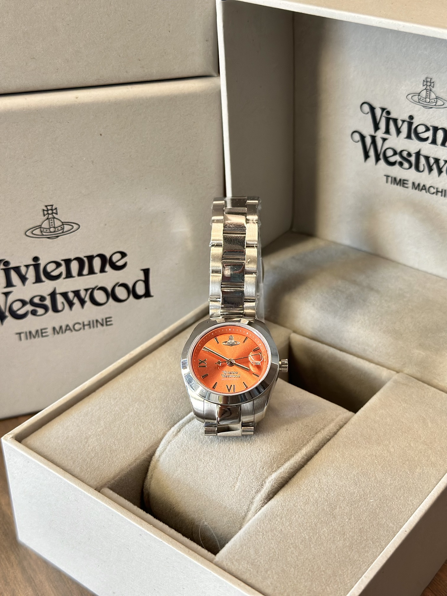 Distinguished by a bold orange dial paired with a silver-tone bracelet - Jewelry 5