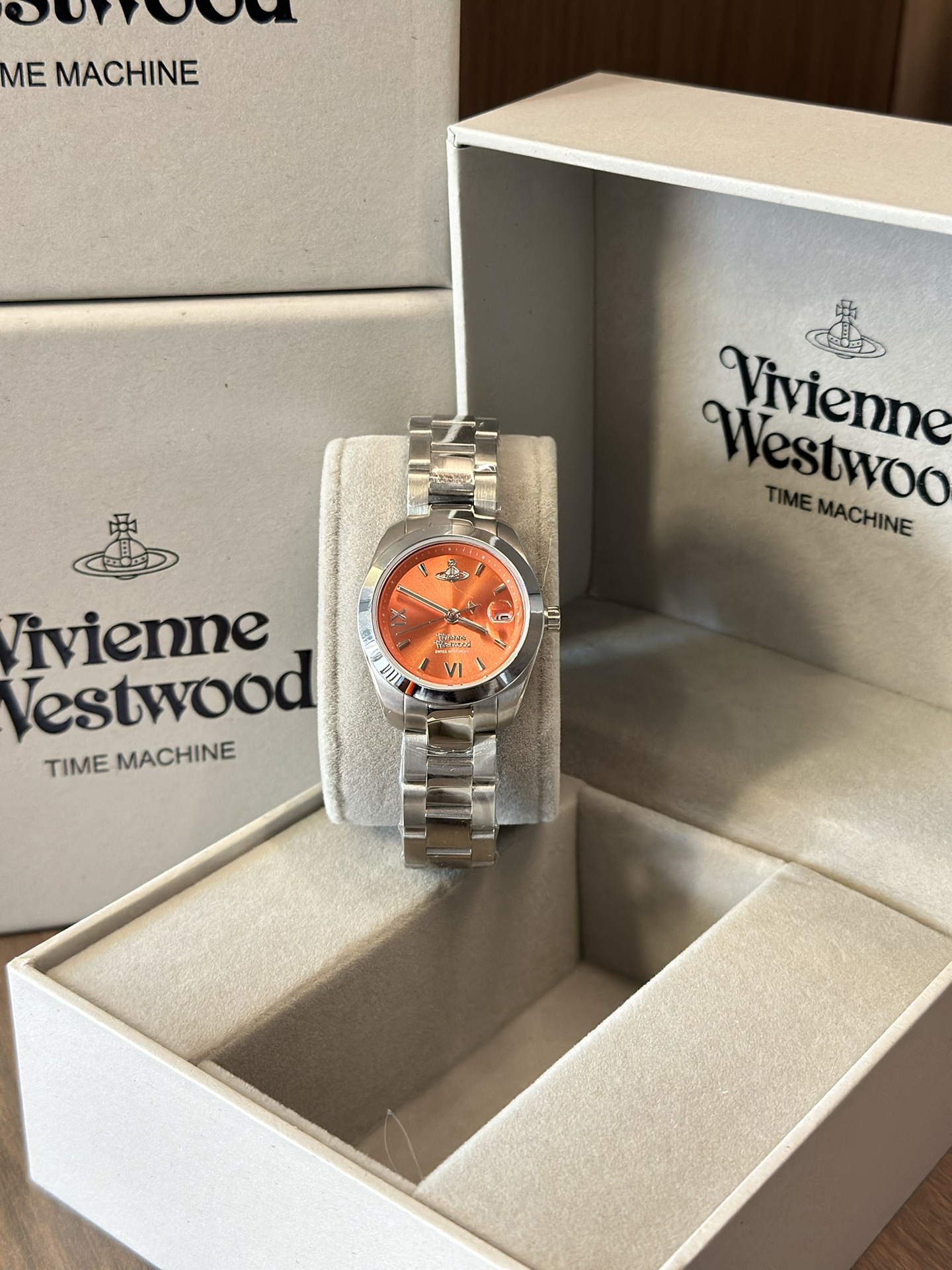 Distinguished by a bold orange dial paired with a silver-tone bracelet - Jewelry 4