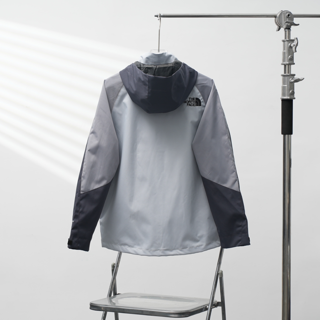 The North Face NJHQ51 Embroidered Hooded Windbreaker Jacket - Gray 2 windows1757053931116 146179322396447289