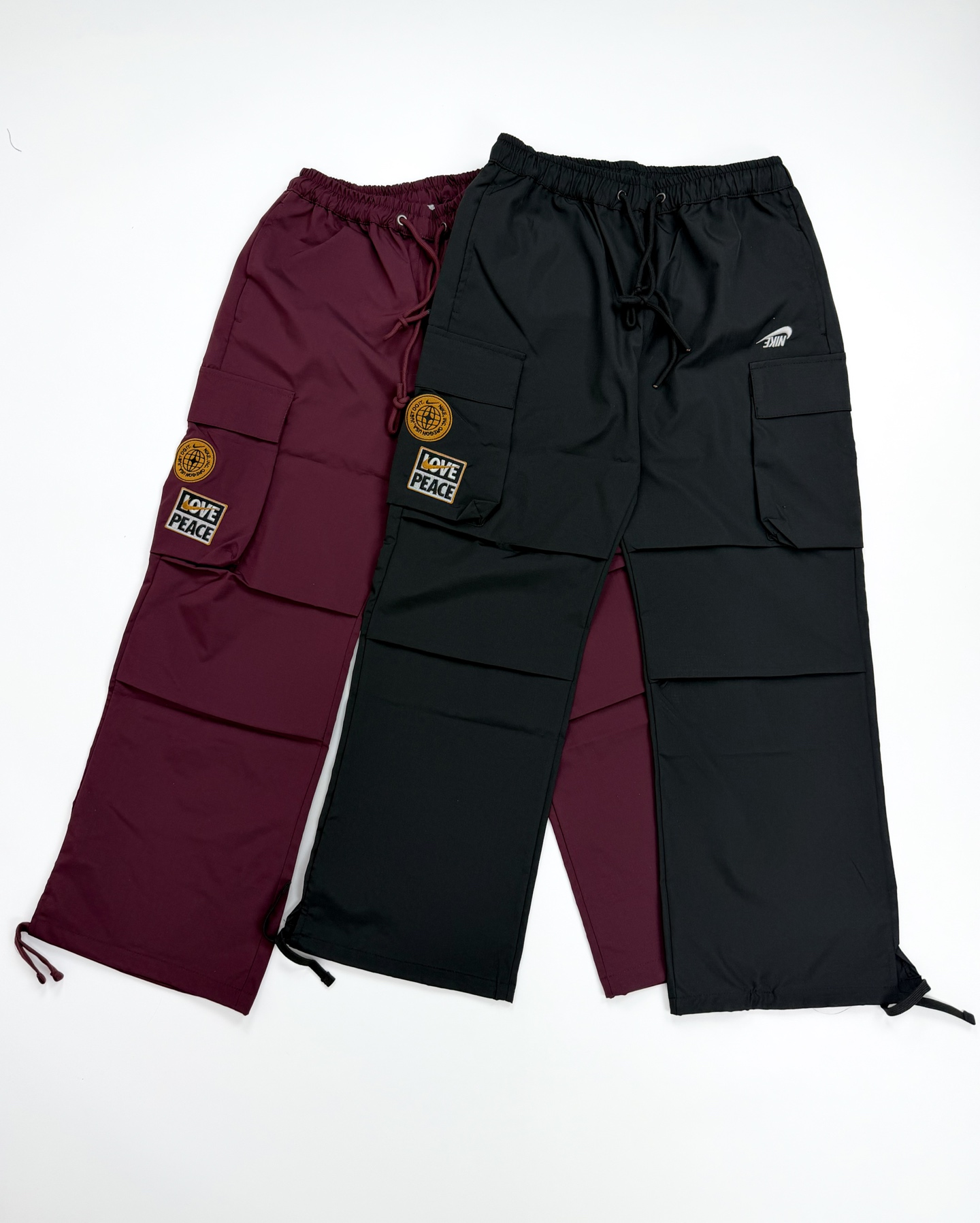 #B197 P120 2026 Nike Pantalones de trabajo casual con bolsillos grandes bordados invertidos y puños elásticos…