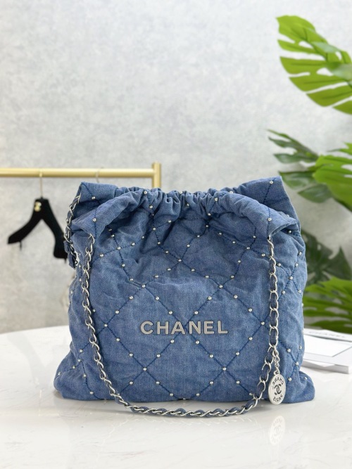 CHANEL Denim Quilted Drawstring Bag with Chain Detail - Blue 1 CHANEL Denim Quilted Drawstring Bag with Chain Detail - Blue