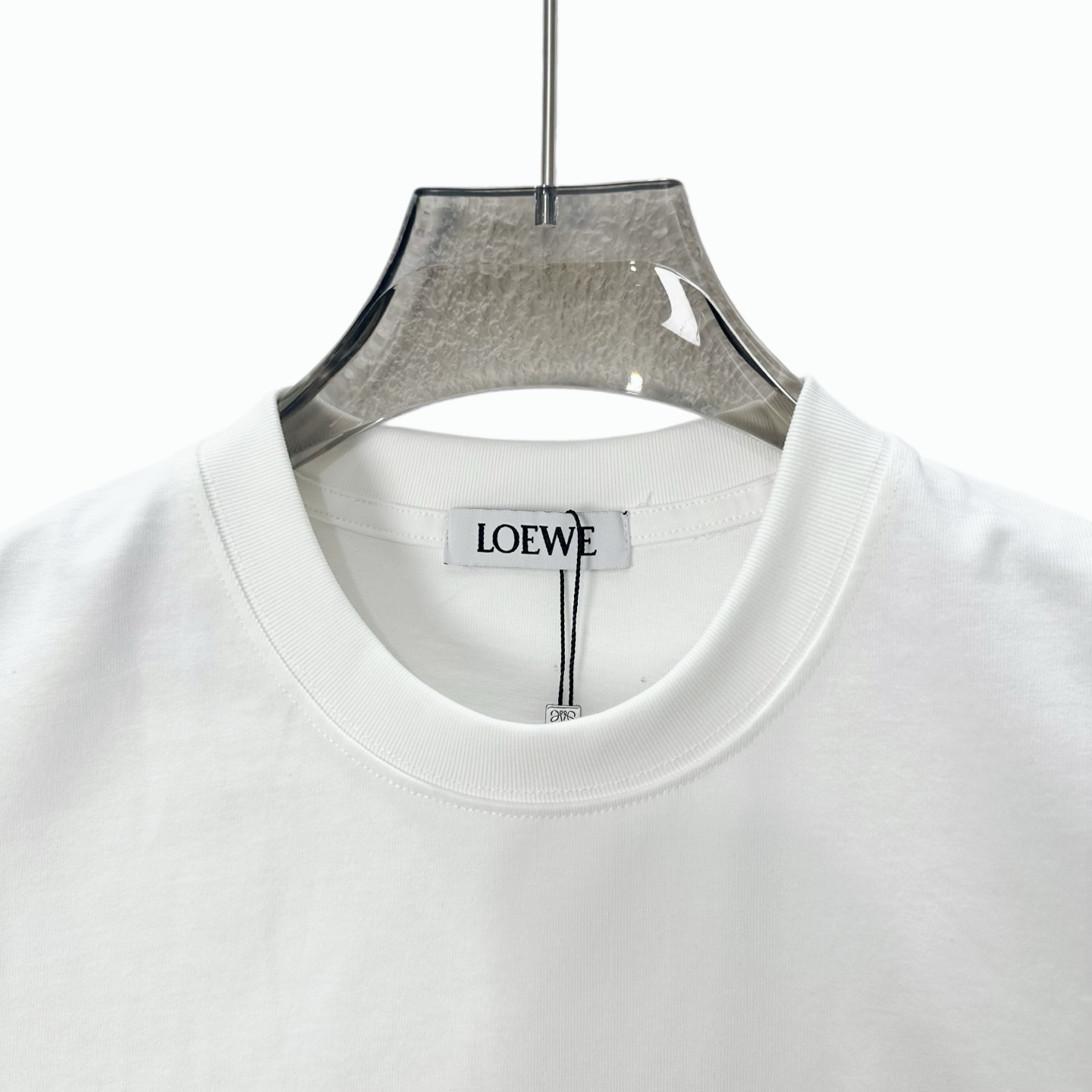LOEWE/罗意威 后背袖口手工剪绣花圆领短袖 黑色 白色