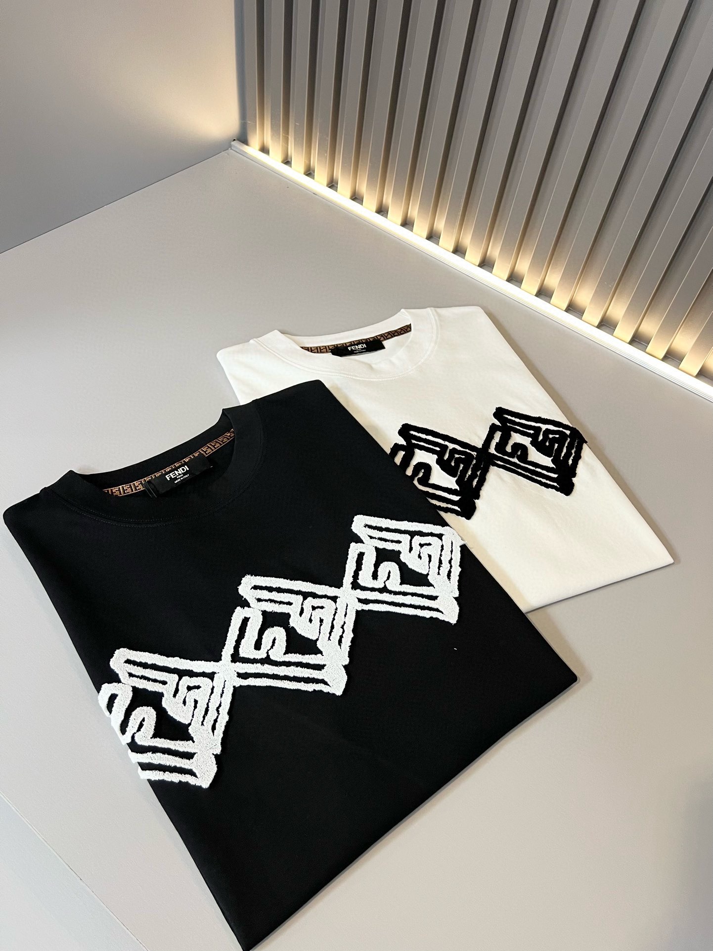 Fendi Clothing T-Shirt Black White Unisex Cotton Spring/Summer Collection Fashion Short Sleeve