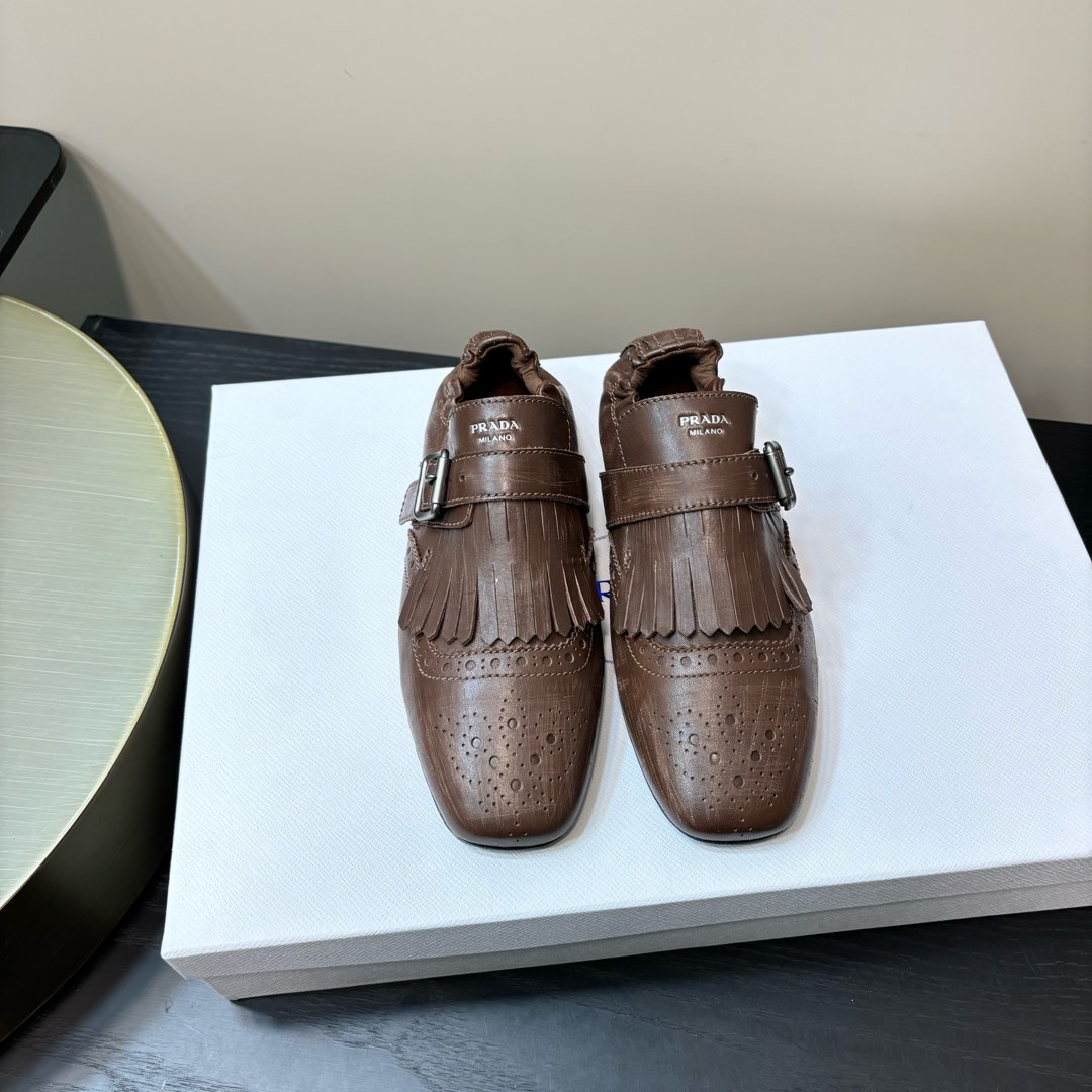 PRADA mocassins à franges brogue en cuir de veau marron