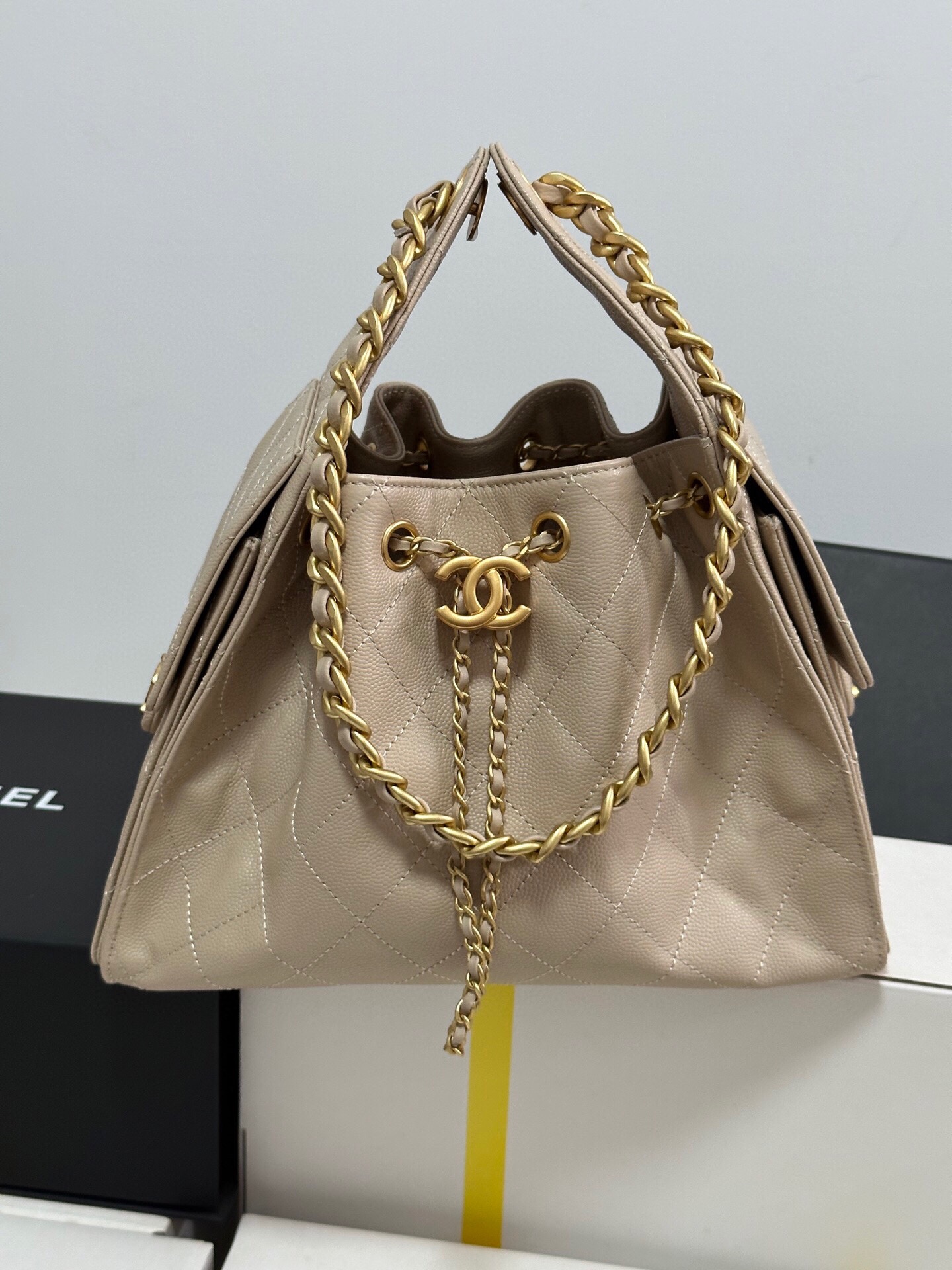 Chanel Beige Leather Drawstring Bucket Bag with Gold-tone Chain
