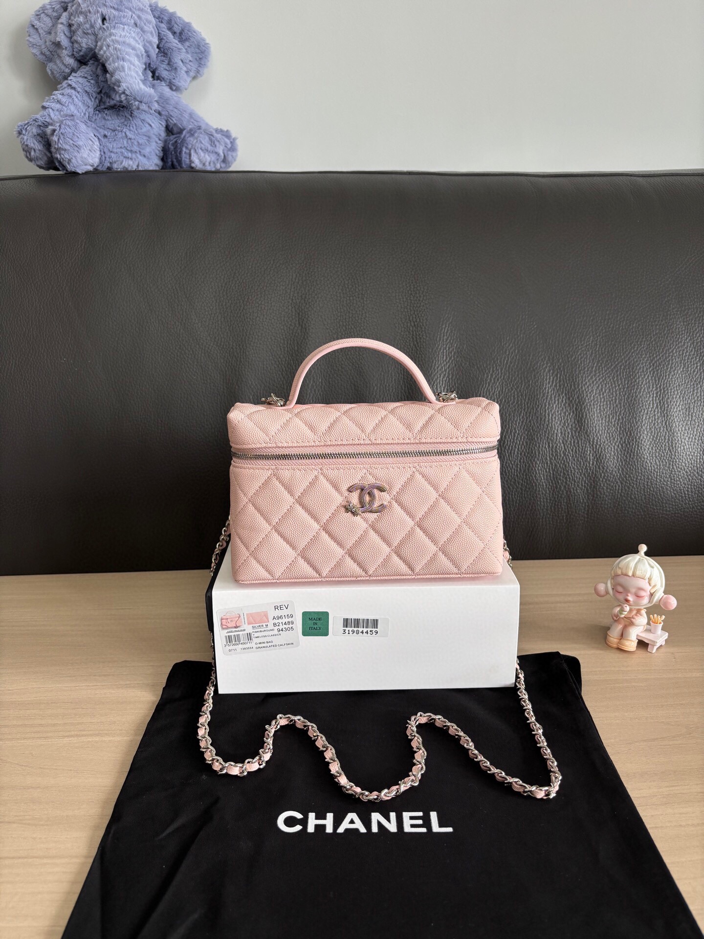 Elegant Chanel Pink Quilted Leather Vanity Bag with Chain Strap