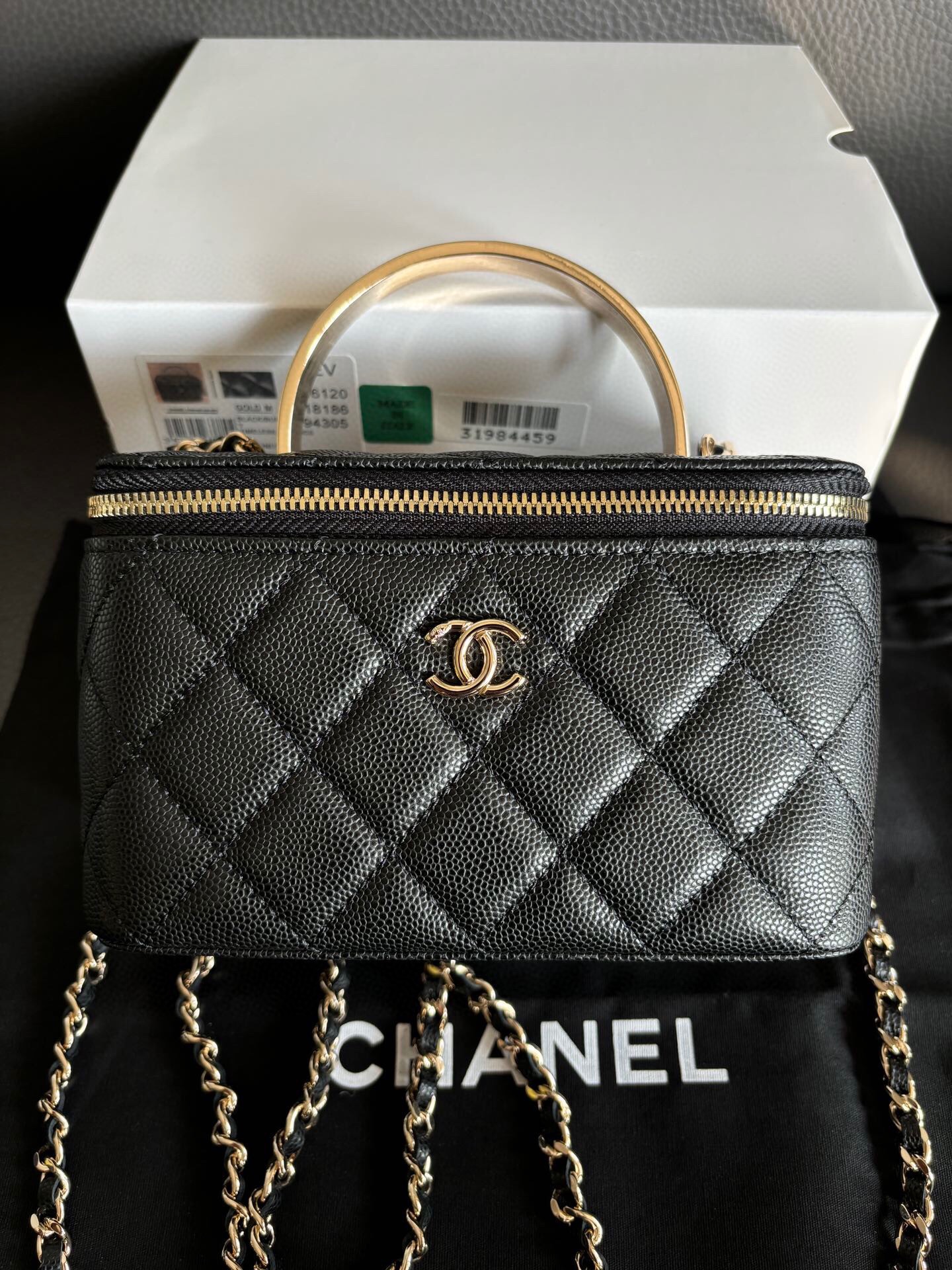 Elegant Chanel Black Quilted Leather Vanity Case with Gold-Tone Hardware