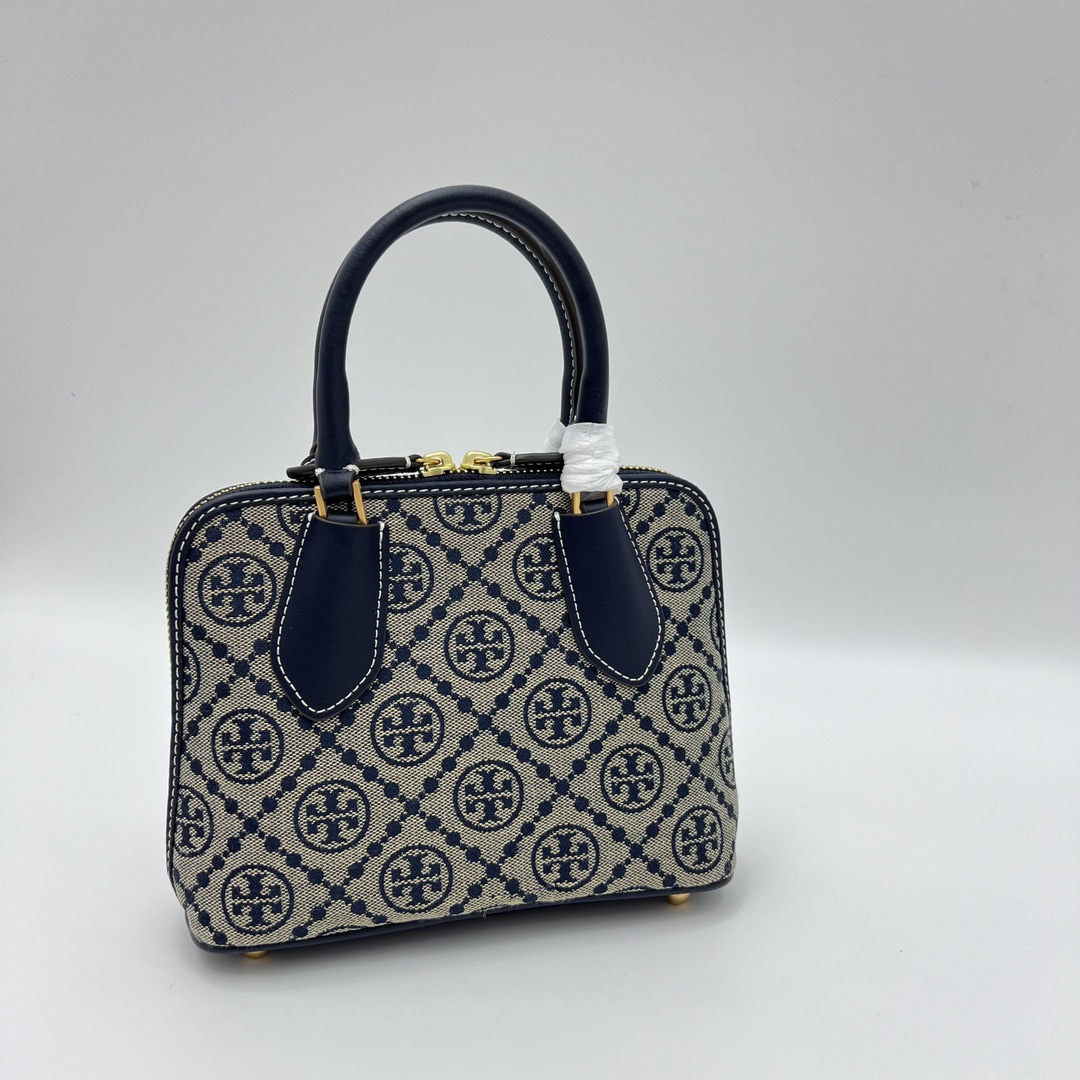 Tory Burch ～ Tory Burch新款swing贝壳包 这款迷你手提包 采用管状顶部提柄设计
