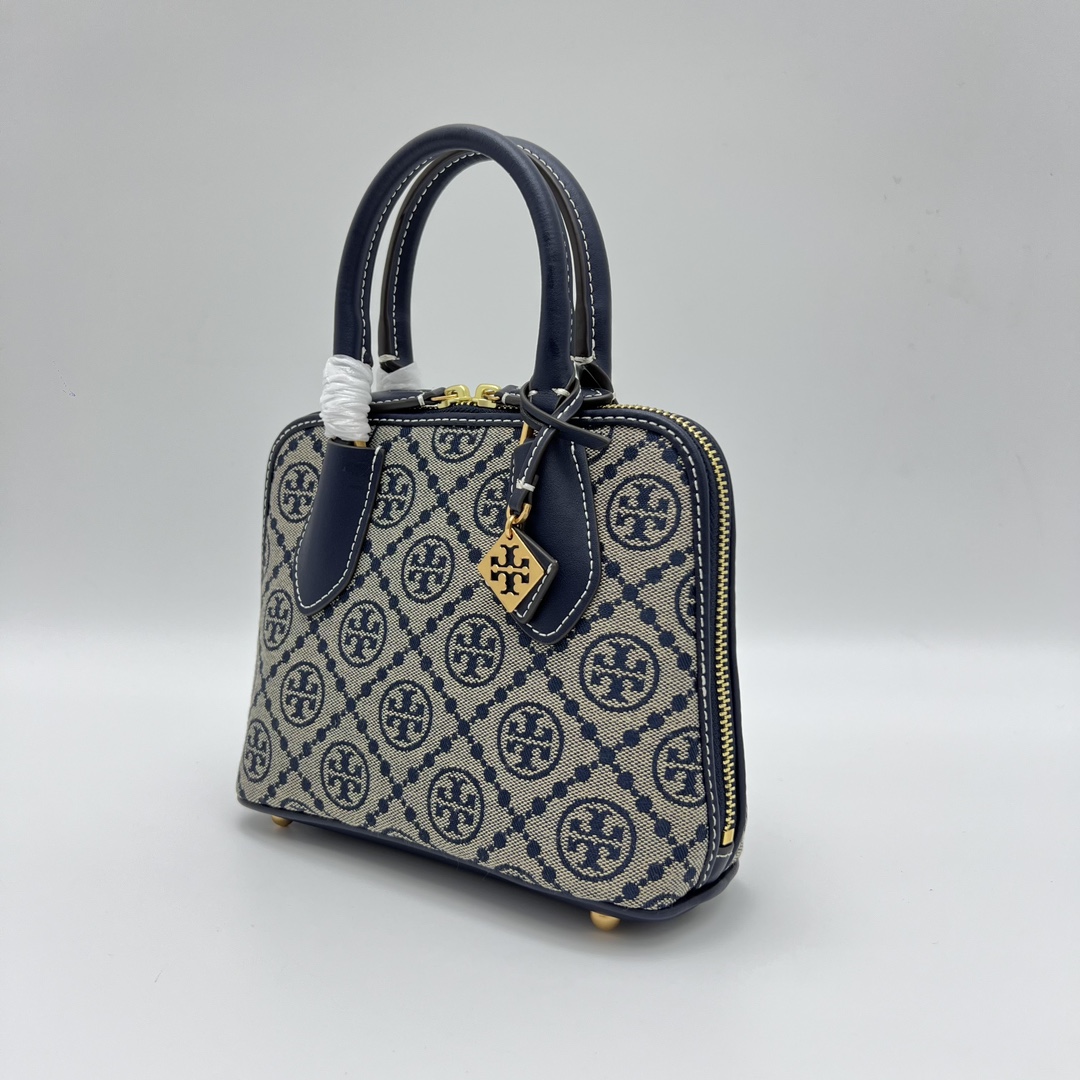 Tory Burch ～ Tory Burch新款swing贝壳包 这款迷你手提包 采用管状顶部提柄设计