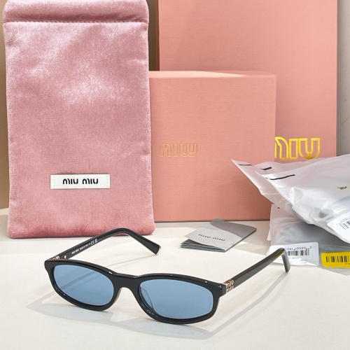 Miu Miu SMU A06 Black Frame Blue Lens Sunglasses | 54-17-140 1 Miu Miu SMU A06 Black Frame Blue Lens Sunglasses | 54-17-140