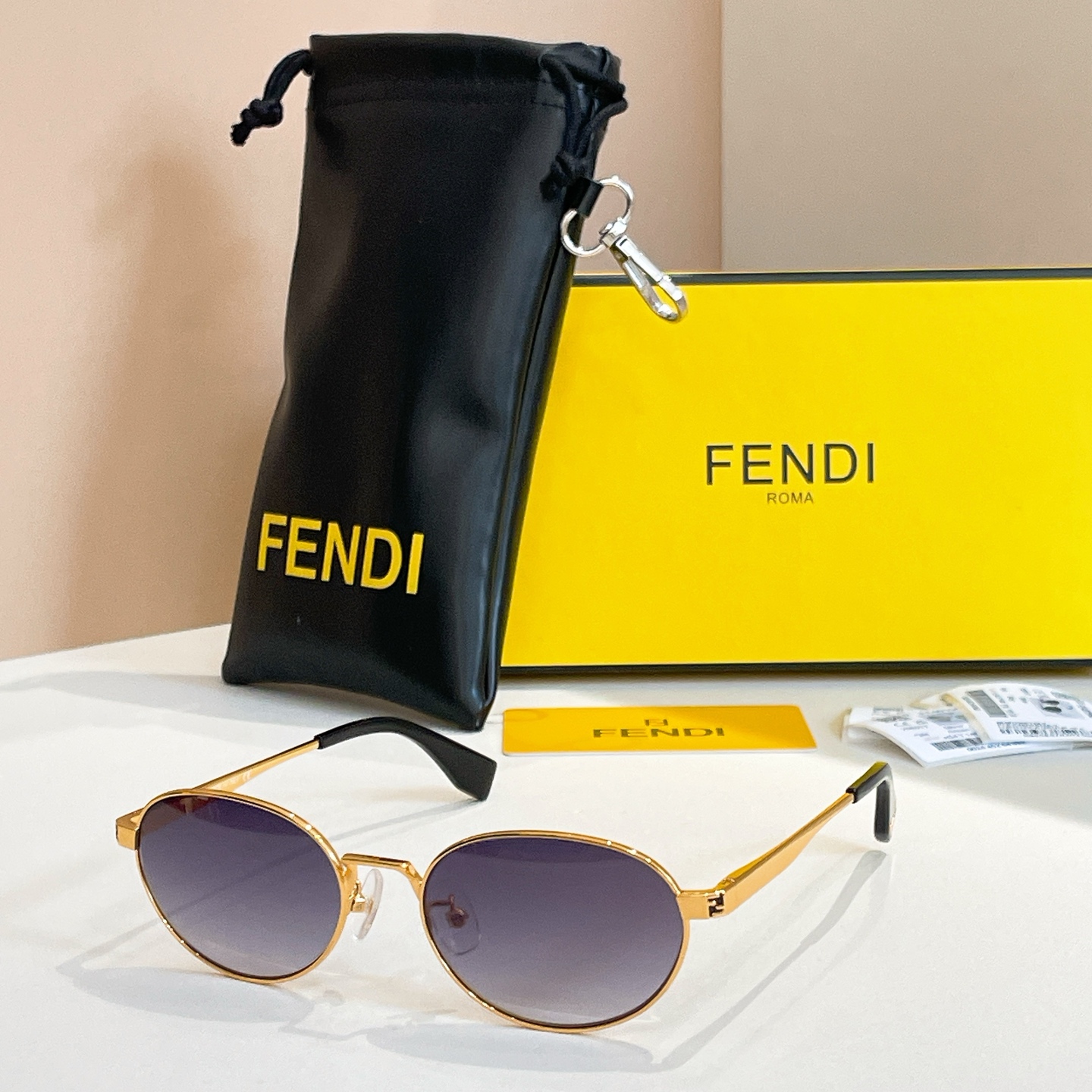 Fendi FE40196U Gold Frame Oval Sunglasses with Grey Gradient Lenses 1 i1756193112111 9457 0 0