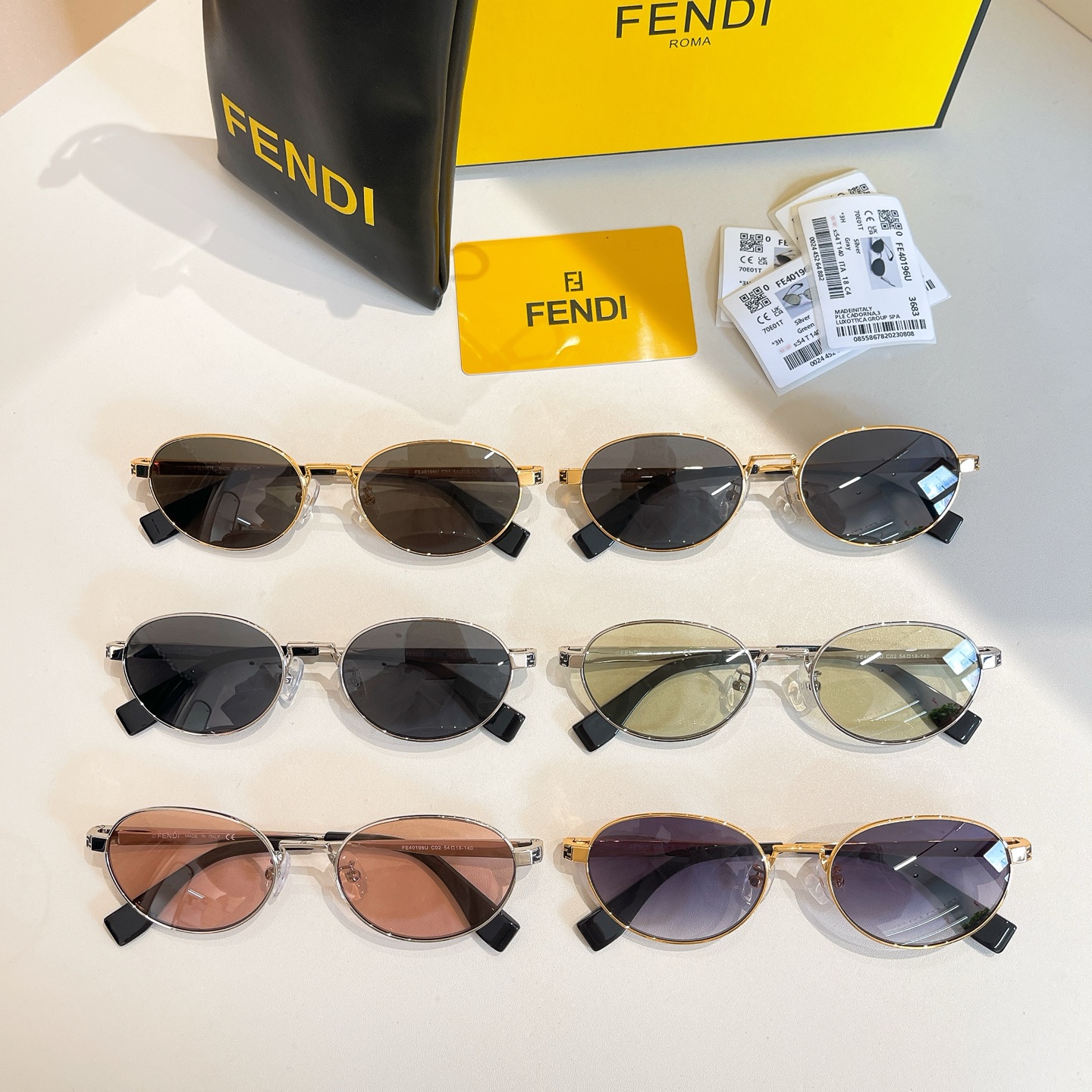 Fendi FE40196U Gold Frame Oval Sunglasses with Grey Gradient Lenses 8 i1756193118575 7713 0 7
