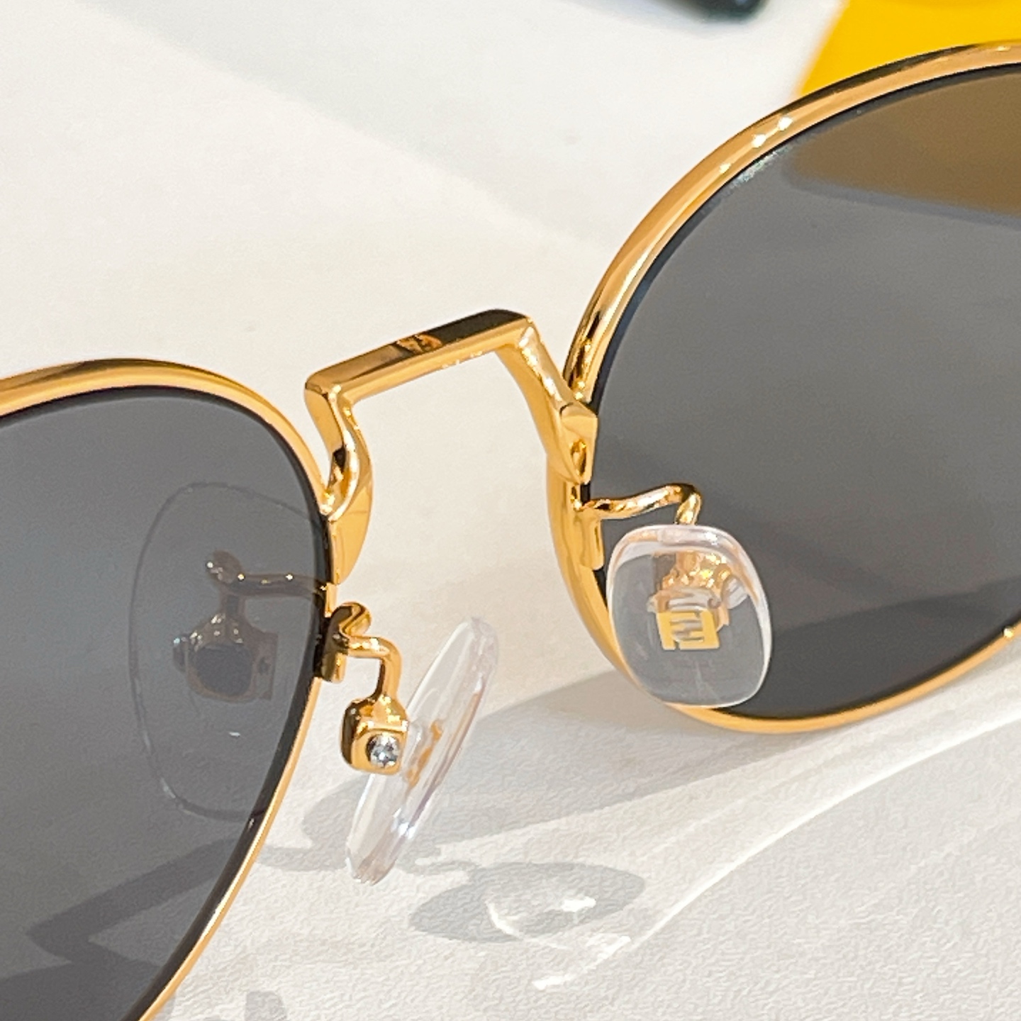 Fendi FE40196U Gold Frame Oval Sunglasses with Grey Gradient Lenses 7 i1756193118615 1487 0 6