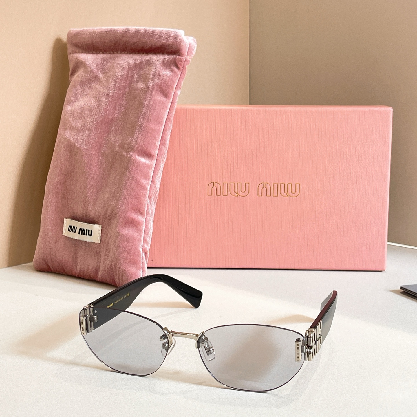 MIUMIU Sunglasses Metal Rimless Geometric
