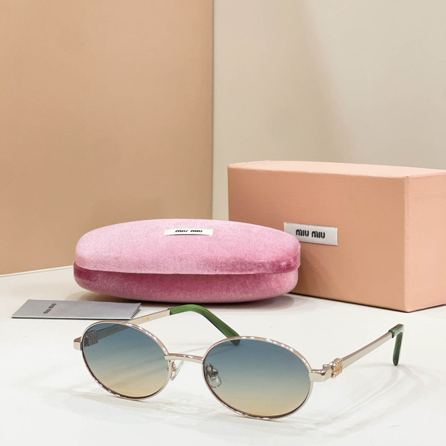 MIUMIU Sunglasses Metal Oval Green Temples