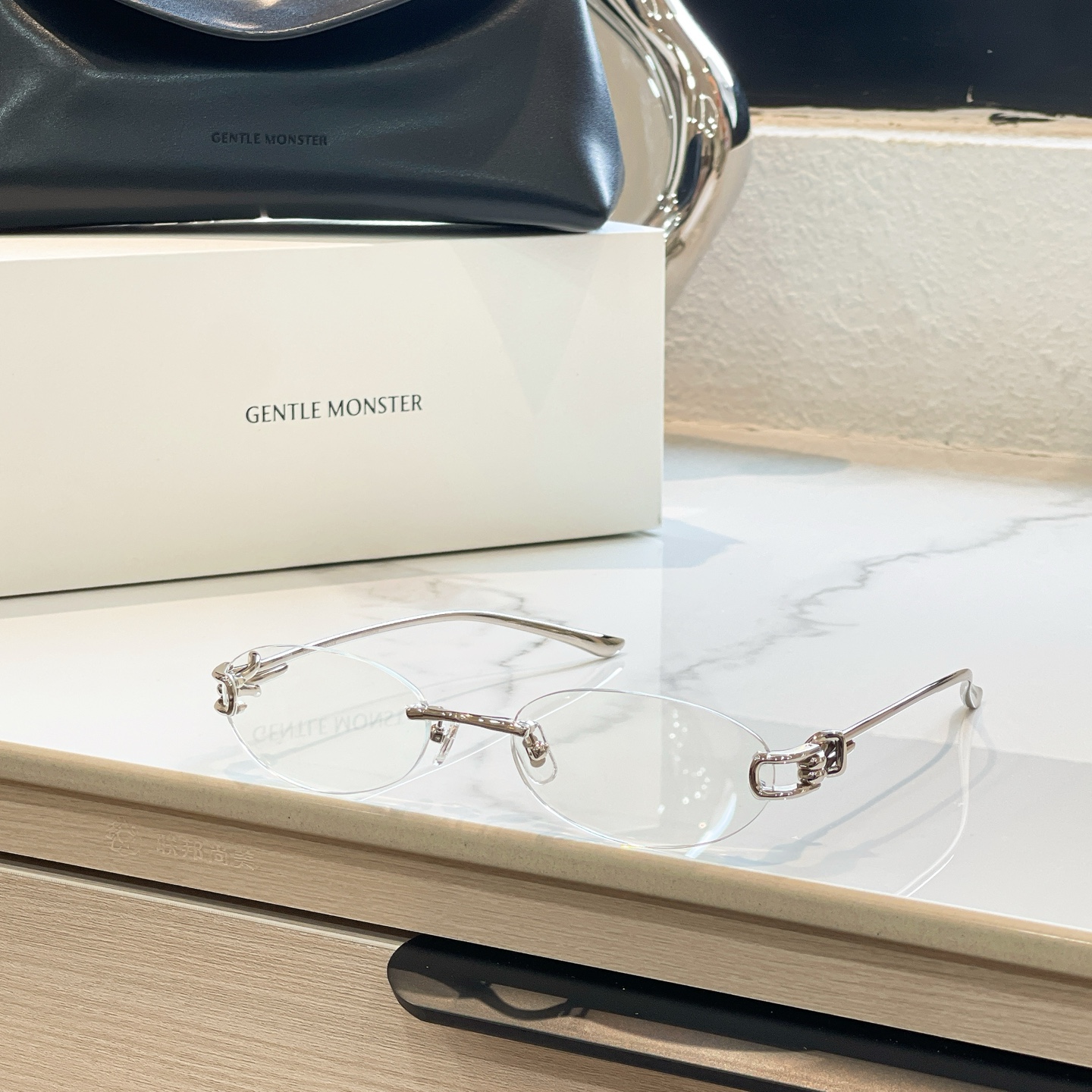 GENTLE MONSTER Frameless Silver Glasses