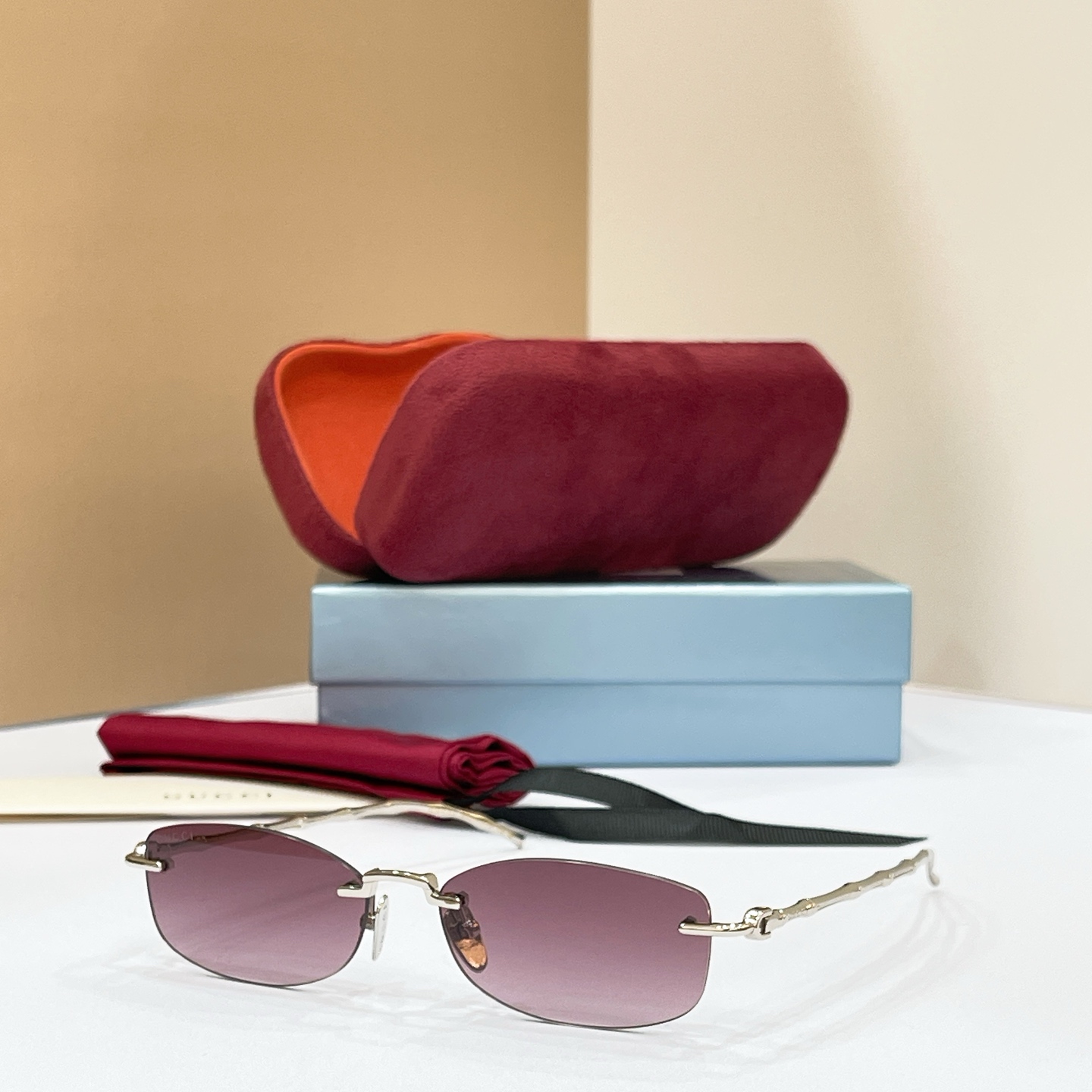 GUCCI Eyewear Rimless Metal Gradient