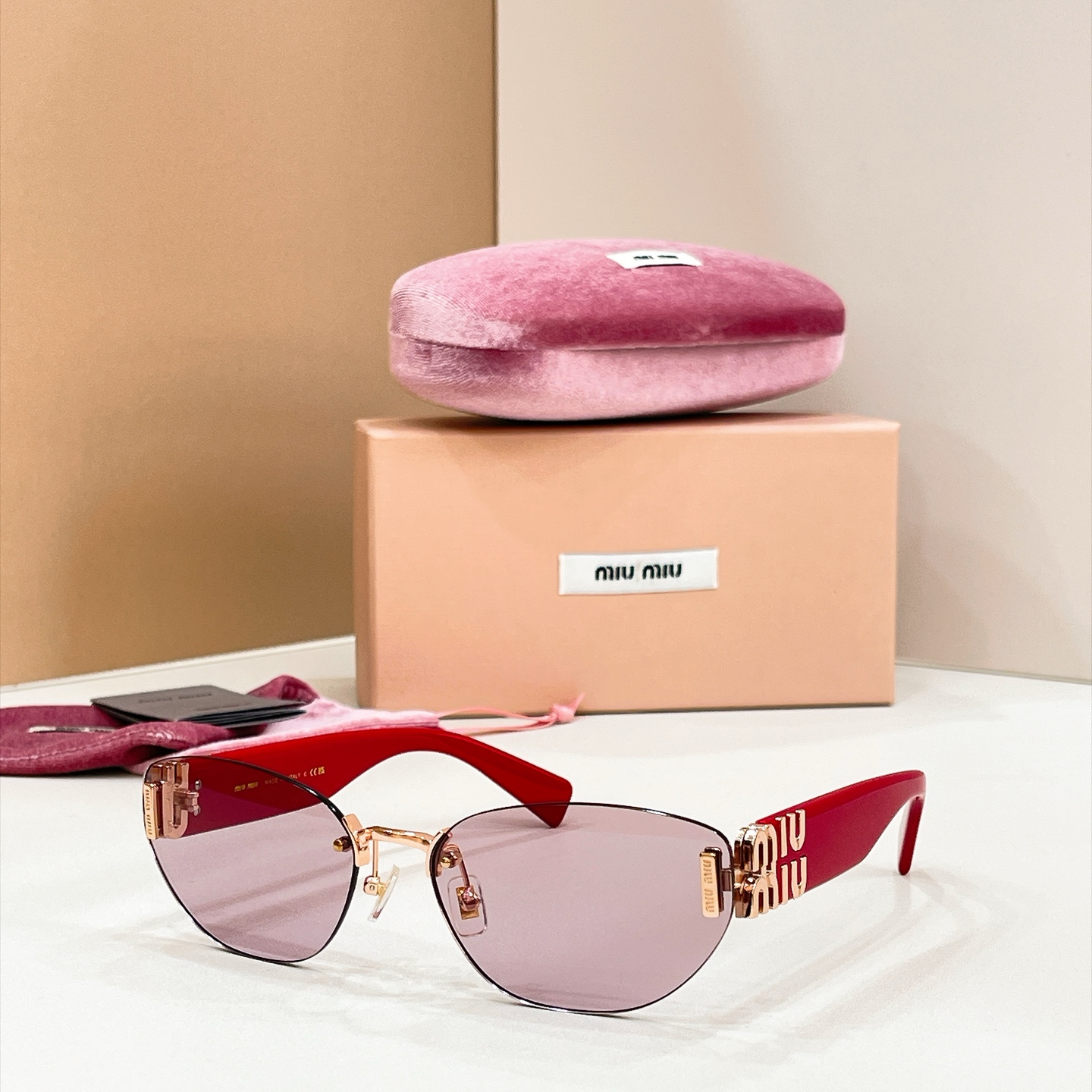 MIUMIU Sunglasses Metal Rimless Red