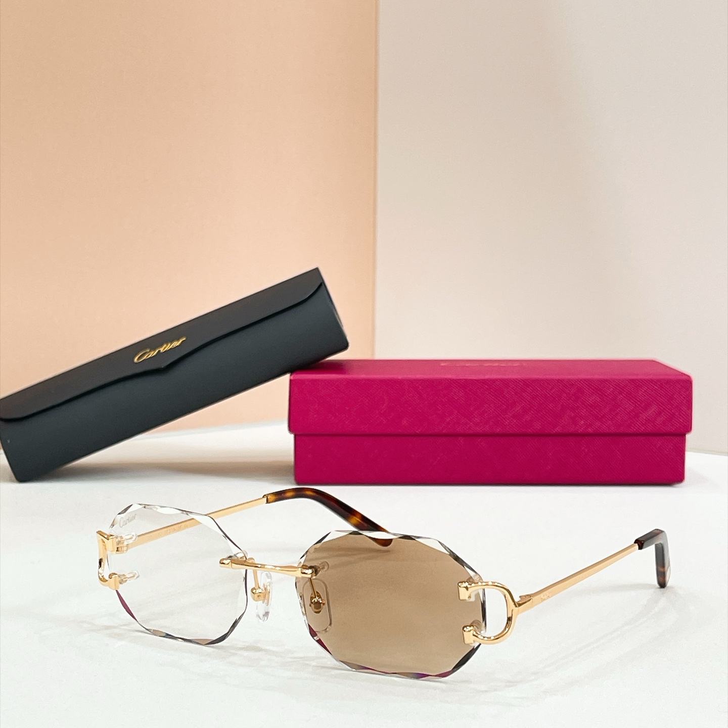 Cartier Eyewear Rimless Metal Polygon Photochromic Lenses