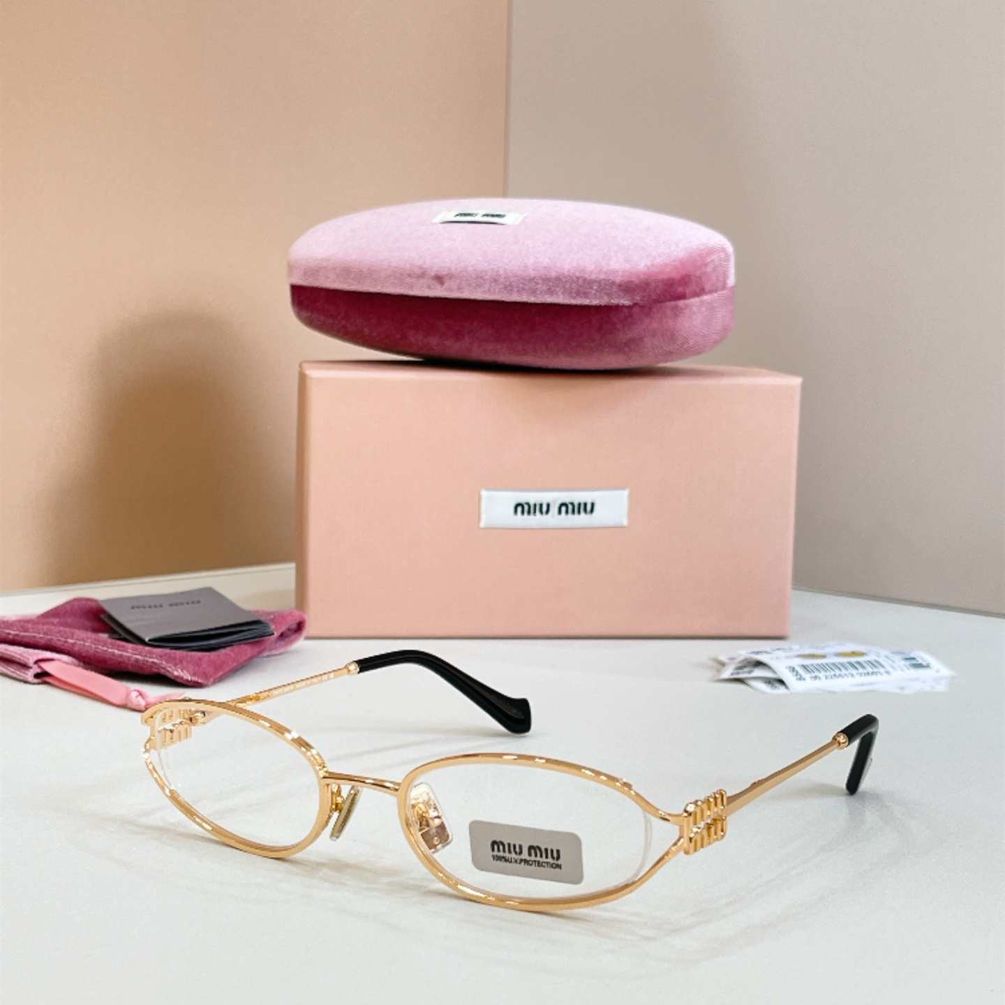 MIUMIU Metal Oval Eyeglasses