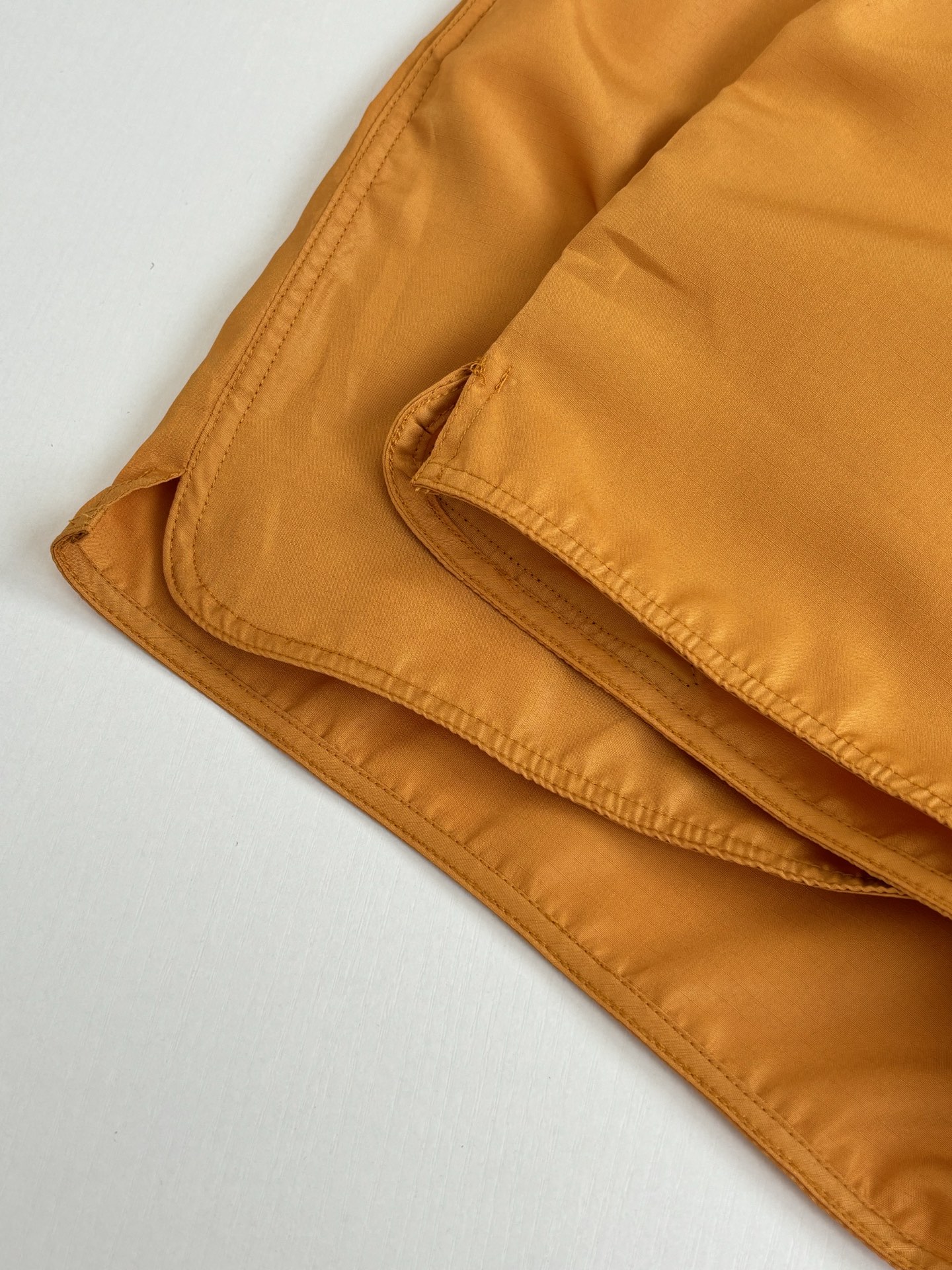 Louis Vuitton 1V/路易 SS26 纯色棋盘格纹皮质徽标沙滩短裤